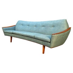 Vintage Danish Mid-Century Modern Curved Sofa With Teak Armrests