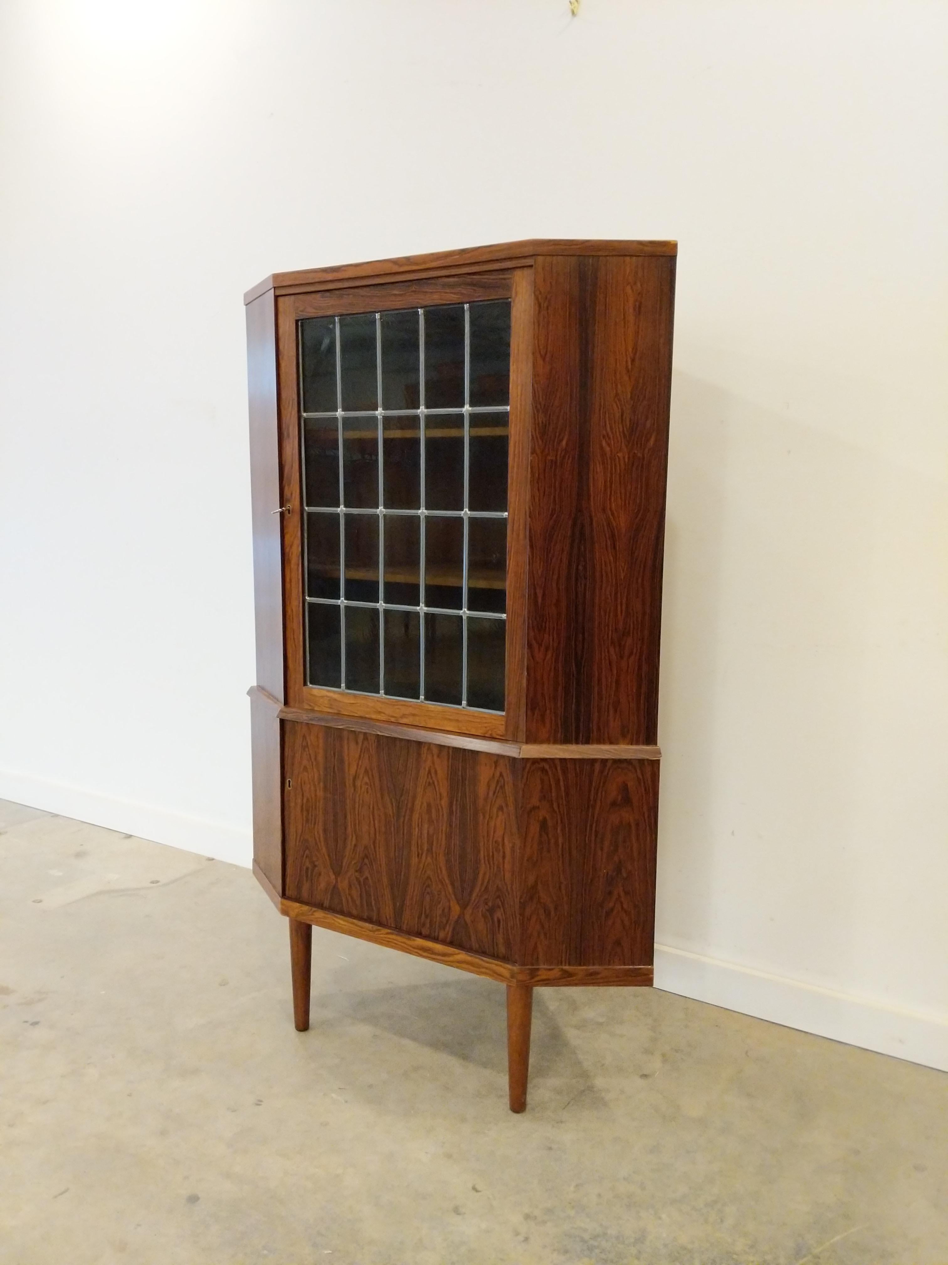 Authentic vintage mid century Danish / Scandinavian Modern rosewood corner cabinet / bar cabinet / dry bar.

This piece will be refinished before delivery. We are typically able to have items ready for delivery within 7-10 days, depending on our