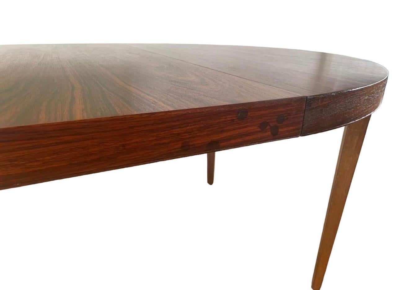 Vintage Danish Mid Century Modern Rosewood Dining Table Extendable with one leaf In Good Condition For Sale In Seattle, WA