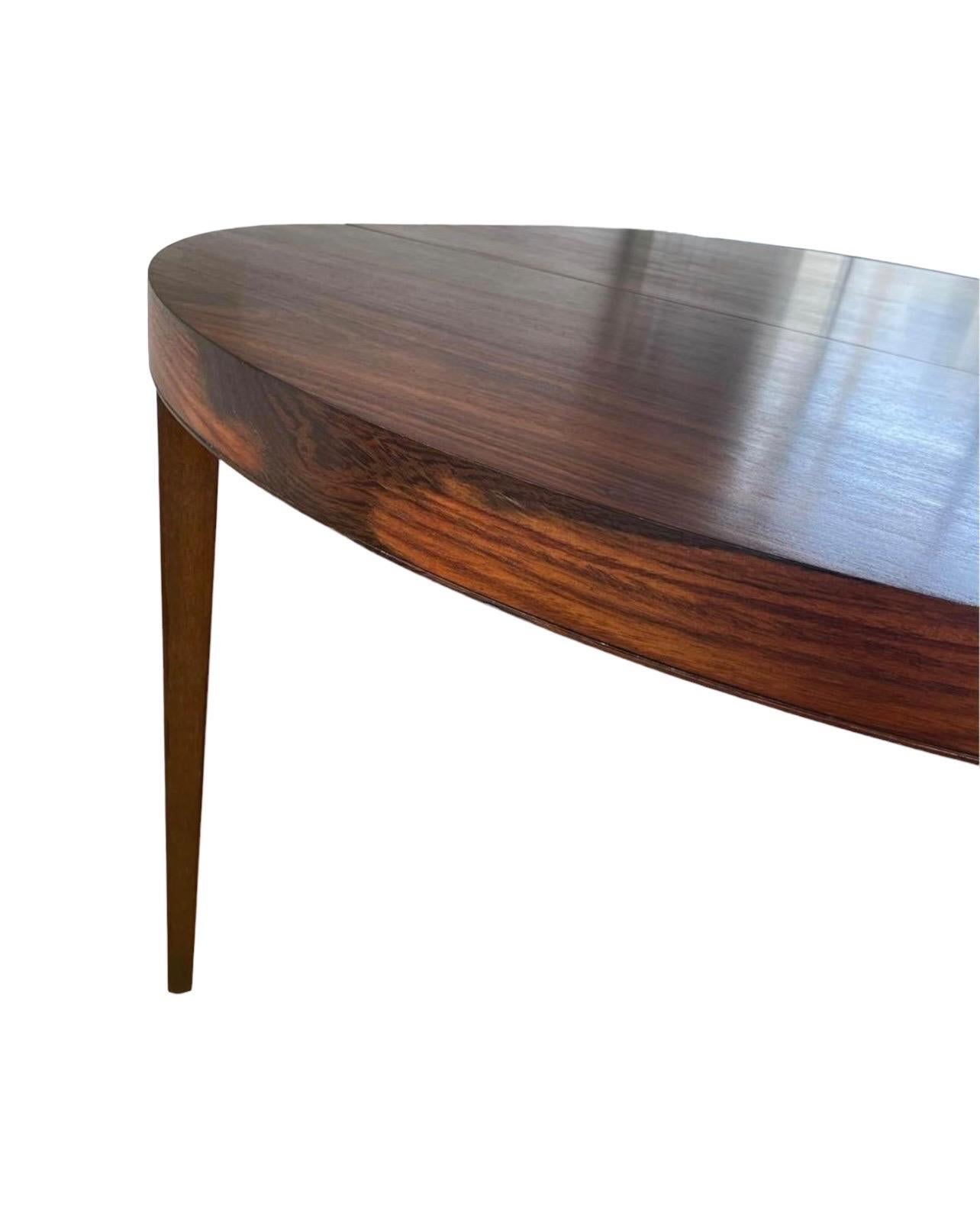 Late 20th Century Vintage Danish Mid Century Modern Rosewood Dining Table Extendable with one leaf For Sale