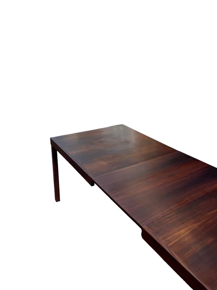 Vintage Danish Mid-Century Modern Rosewood Dining Table with Extension Leaf In Good Condition For Sale In Seattle, WA