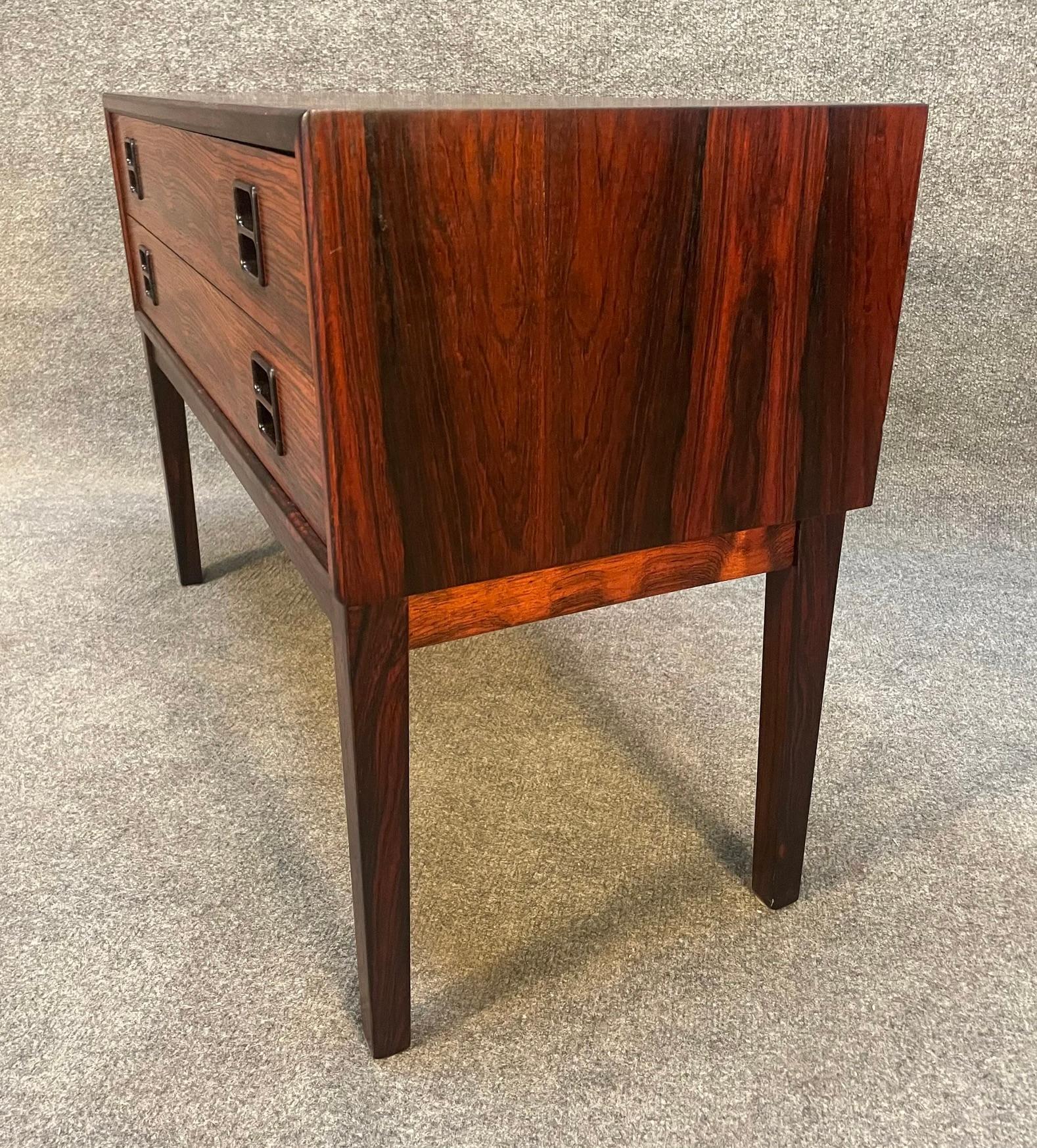 Here is a beautiful Scandinavian modern entry chest - nightstand in rosewood manufactured by Brouer Mobekfabrik ran Denmark in the 1960's.
This lovely case piece, recently imported from Denmark to California before its refinishing, features a