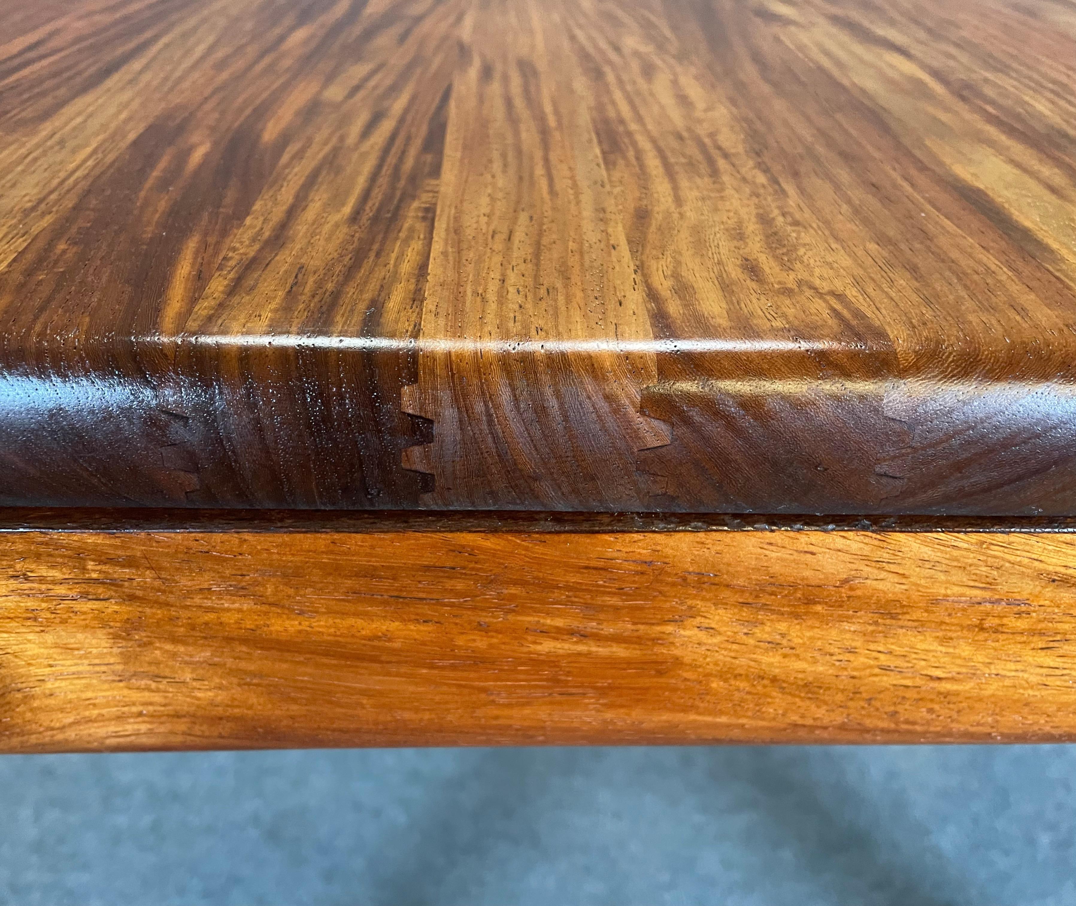 Here is a beautiful scandinavian modern dining table in mahogany manufactured in Denmark in the early 1970's.
This special piece, entirely made out of solid mahogany wood, was recently imported from Europe to California before its refinishing and
