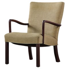 Poltrona danese vintage in teak massiccio della metà del secolo scorso, anni '50