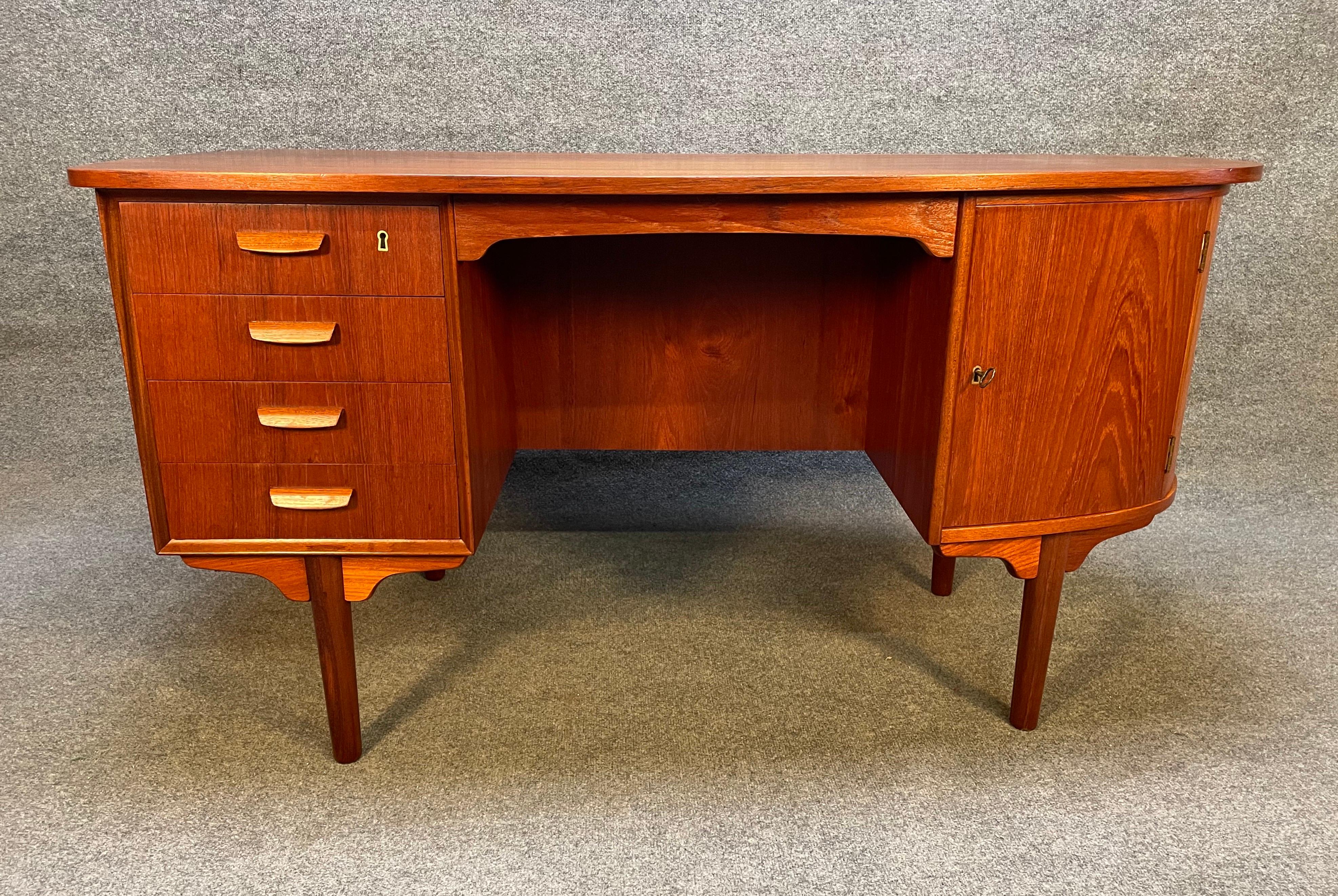 Here is a beautiful Scandinavian modern desk in teak wood designed by H.P Hansen and manufactured by Randers Mobelfabrik in Denmark in the 1960's.
This exquisite desk, recently imported from Europe to California before its refinishing, features a