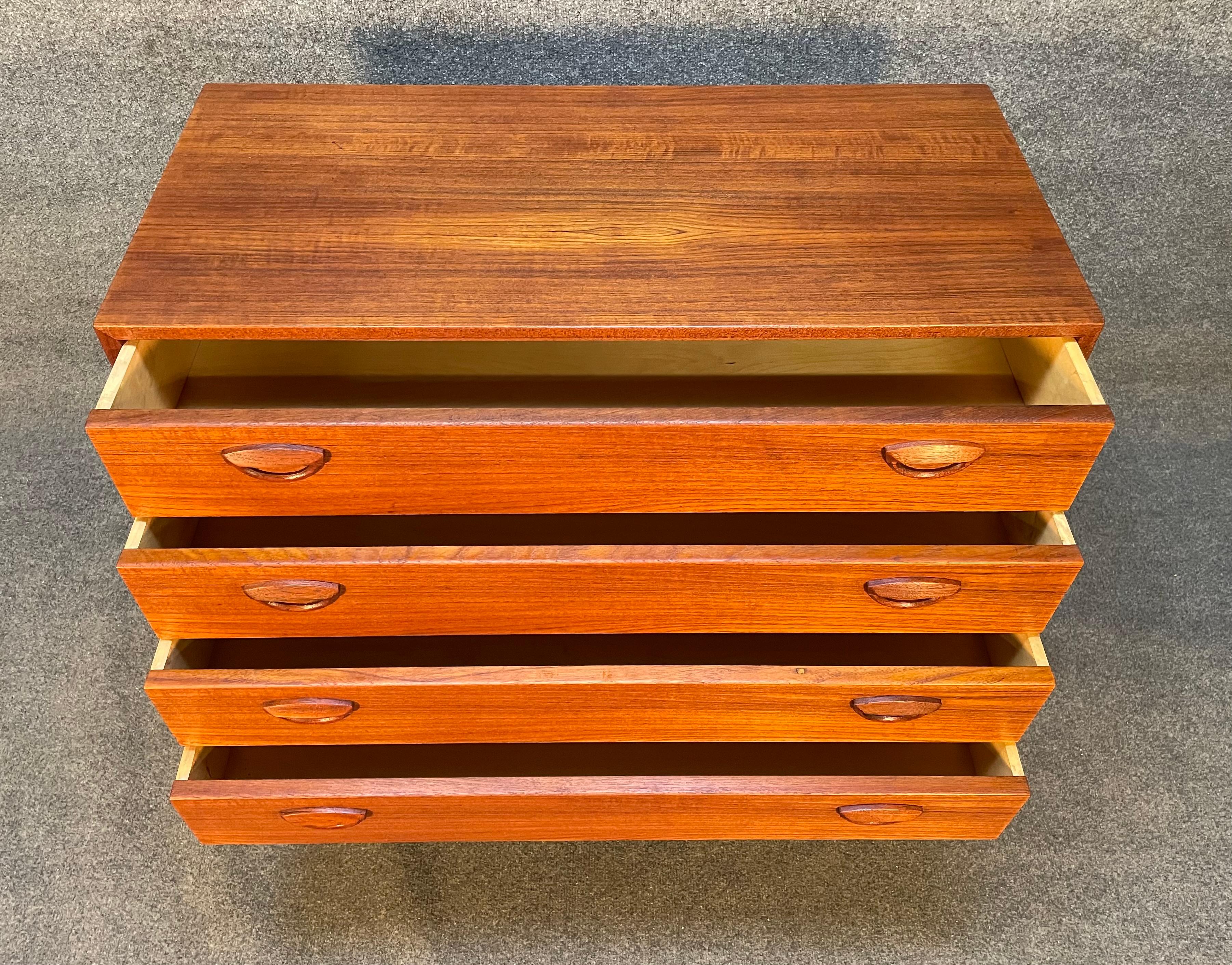 Here is a beautiful Scandinavian modern chest of drawers in teak designed by Kai Kristiansen and manufactured by Feldballes Mobelfabrik in Denmark in the 1960's.
This exquisite case piece, recently imported from Europe to California before its