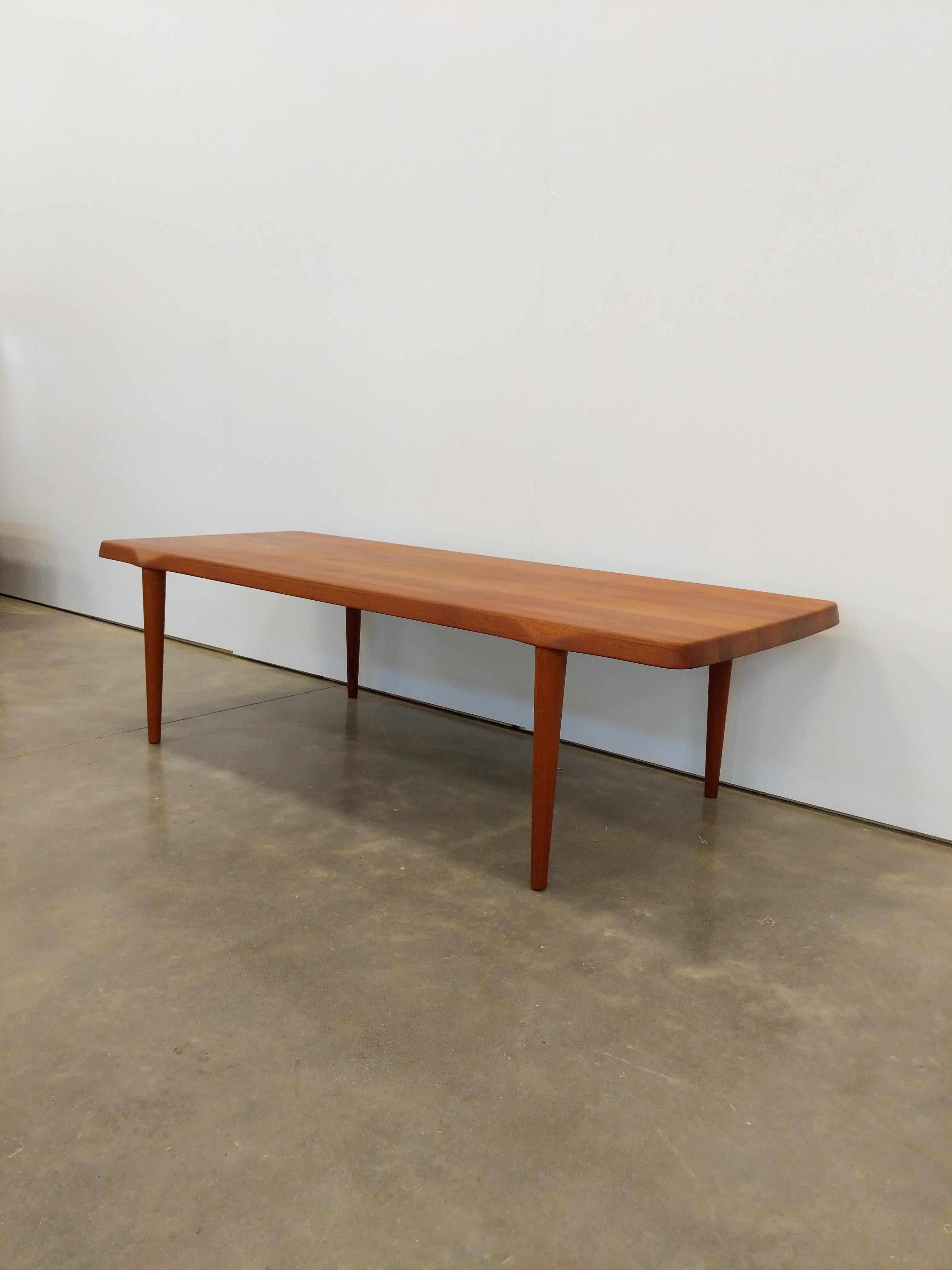 Authentic vintage mid century Danish / Scandinavian Modern teak coffee table.

This table is solid teak.

This piece is in excellent refinished condition with very few signs of age-related wear (see photos).

If you would like any additional