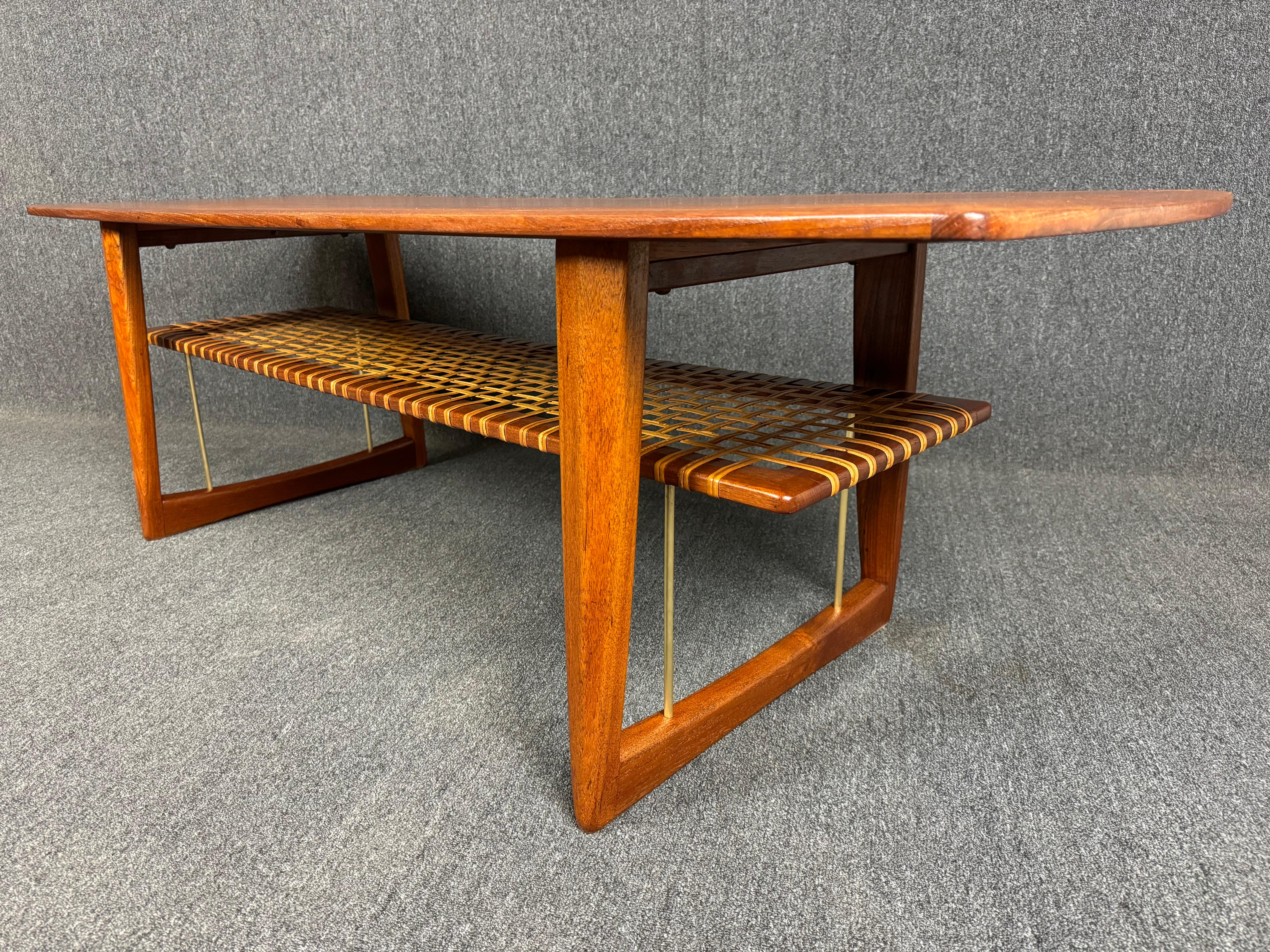 Vintage Danish Mid Century Modern Teak Coffee Table With Rattan Magazine Shelf In Good Condition For Sale In San Marcos, CA