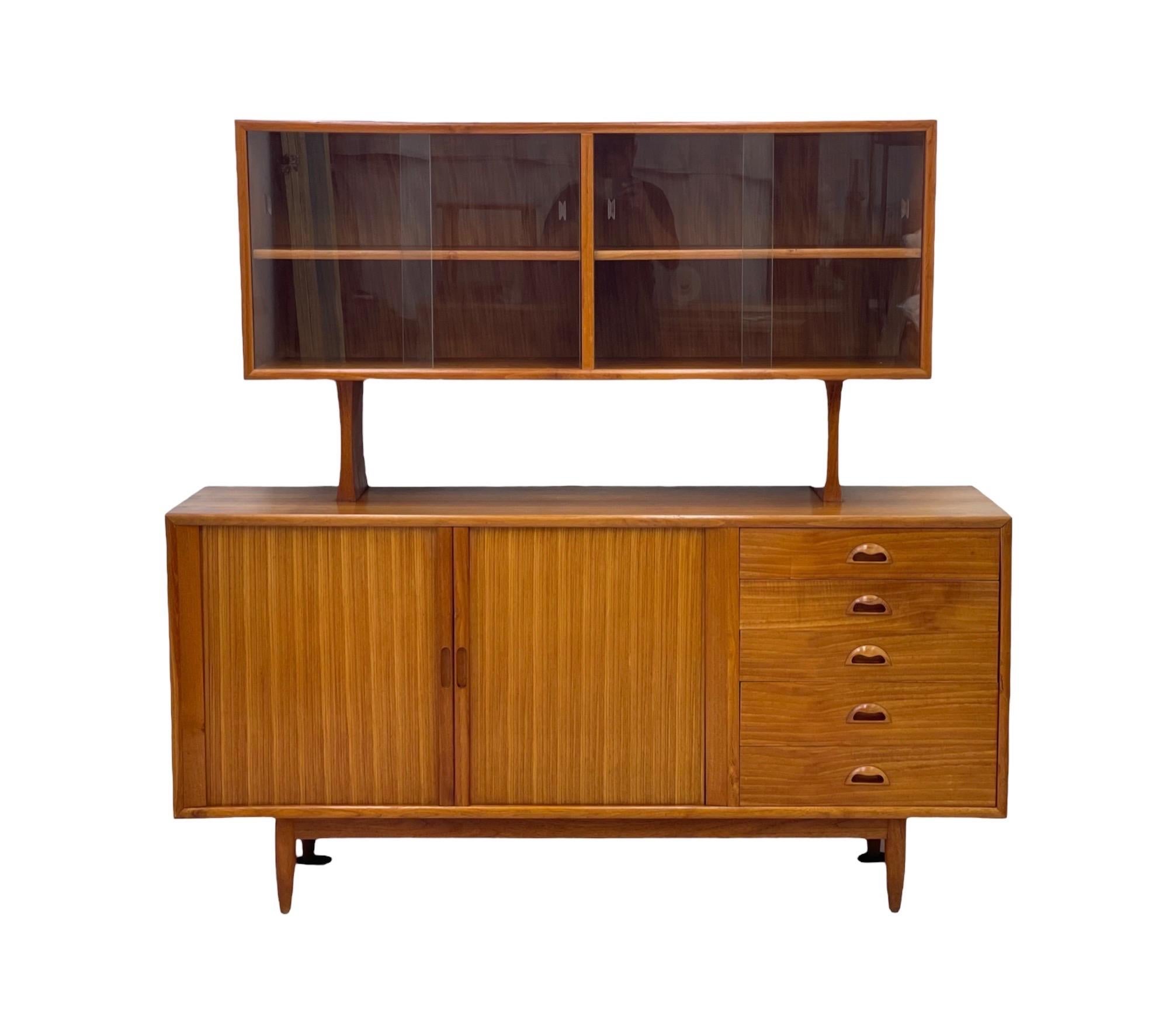 Vintage Danish Mid-Century Modern Teak Credenza Hutch tambour door dovetailed drawers

Dimensions overall 65 W; 62 H; 19 D 
Credenza cabinet dimension 36 W; 22 H; 17 D

Shelves adjustable and removable.