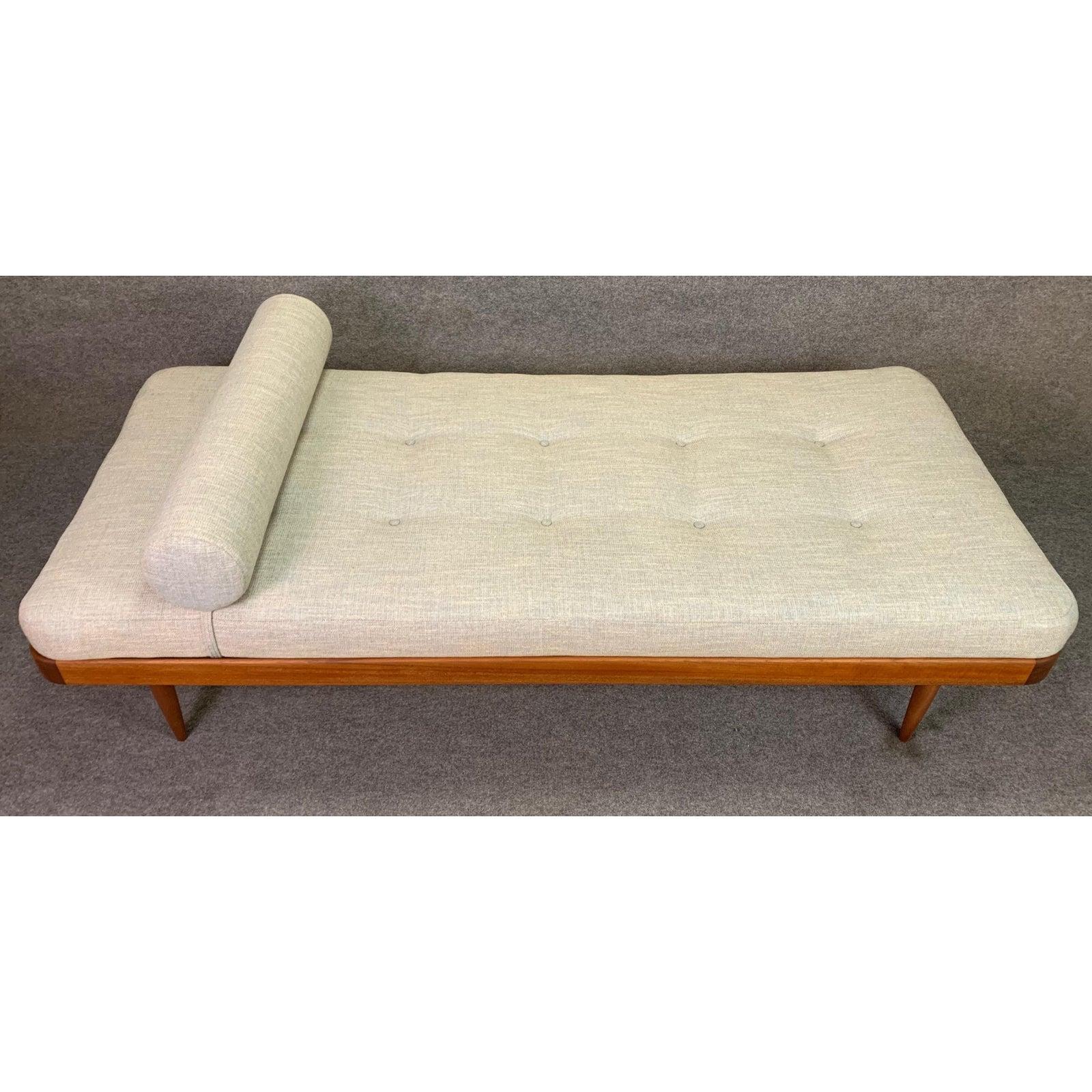 Here’s a beautiful Scandinavian Modern daybed with a teak frame that was recently imported from Denmark to California before its restoration. This lovely and comfortable piece features a solid teak frame with solid wood slats and legs and a brand