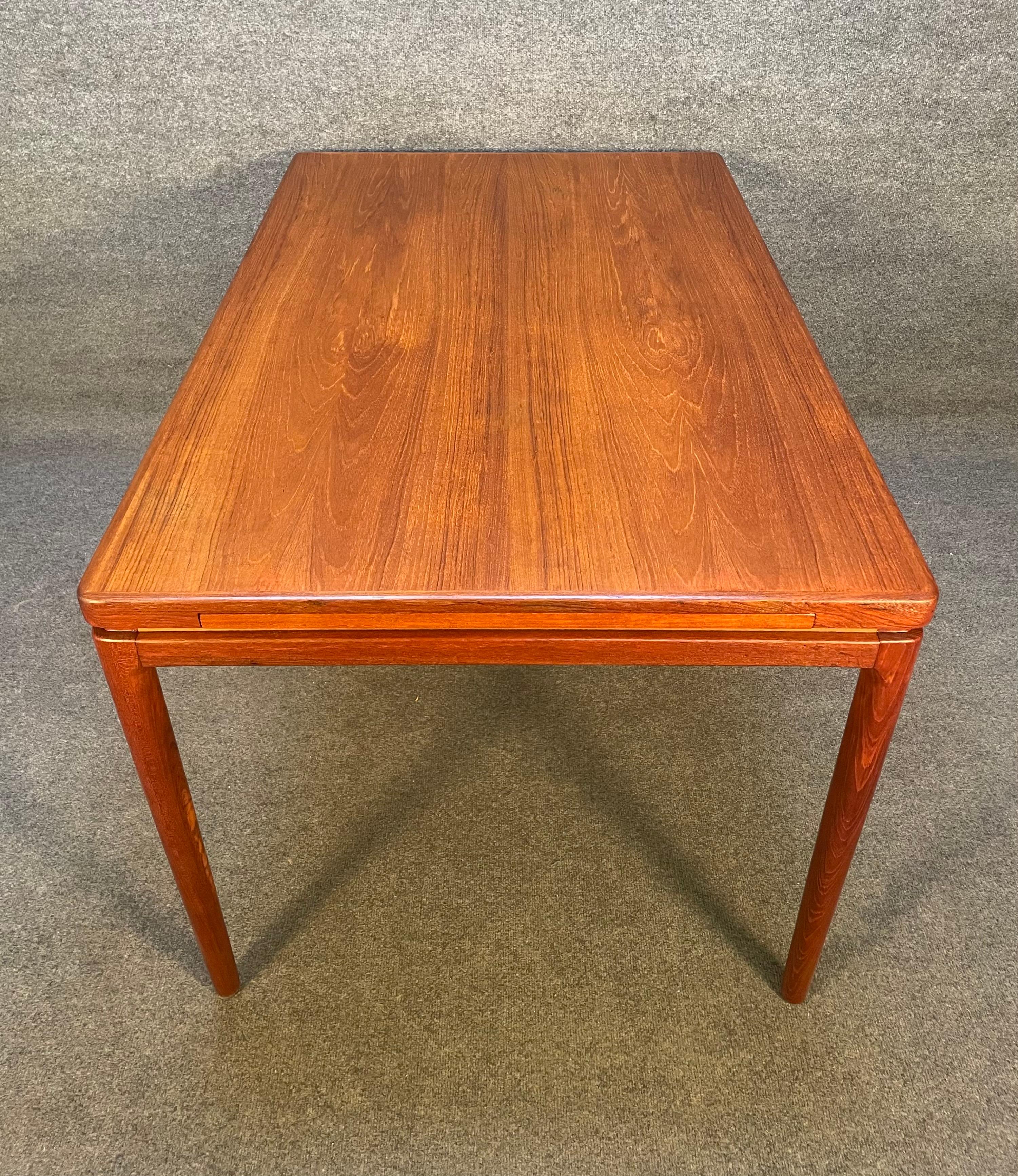 Here is a beautiful Scandinavian Modern dining table in teak wood designed by Johannes Andersen and manufactured by Christian Linnenberg Mobelfabrik in Denmark in the 1960s.
This lovely table, recently imported from Europe to California before its