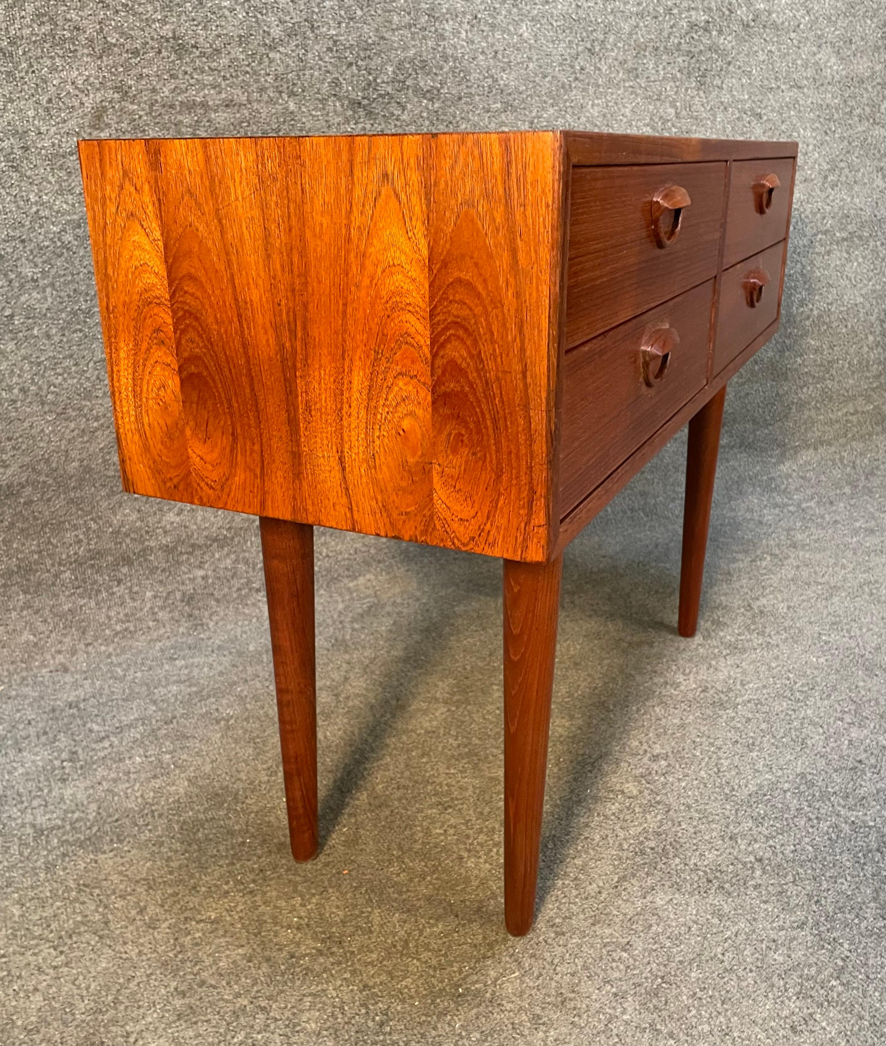Here is a beautiful Scandinavian modern chest of drawers in teak wood designed by Kai Kristiansen and manufactured by Feldballes Mobelfabrik in Denmark inn the 1960's.
This lovely piece, recently imported from Europe to California before its