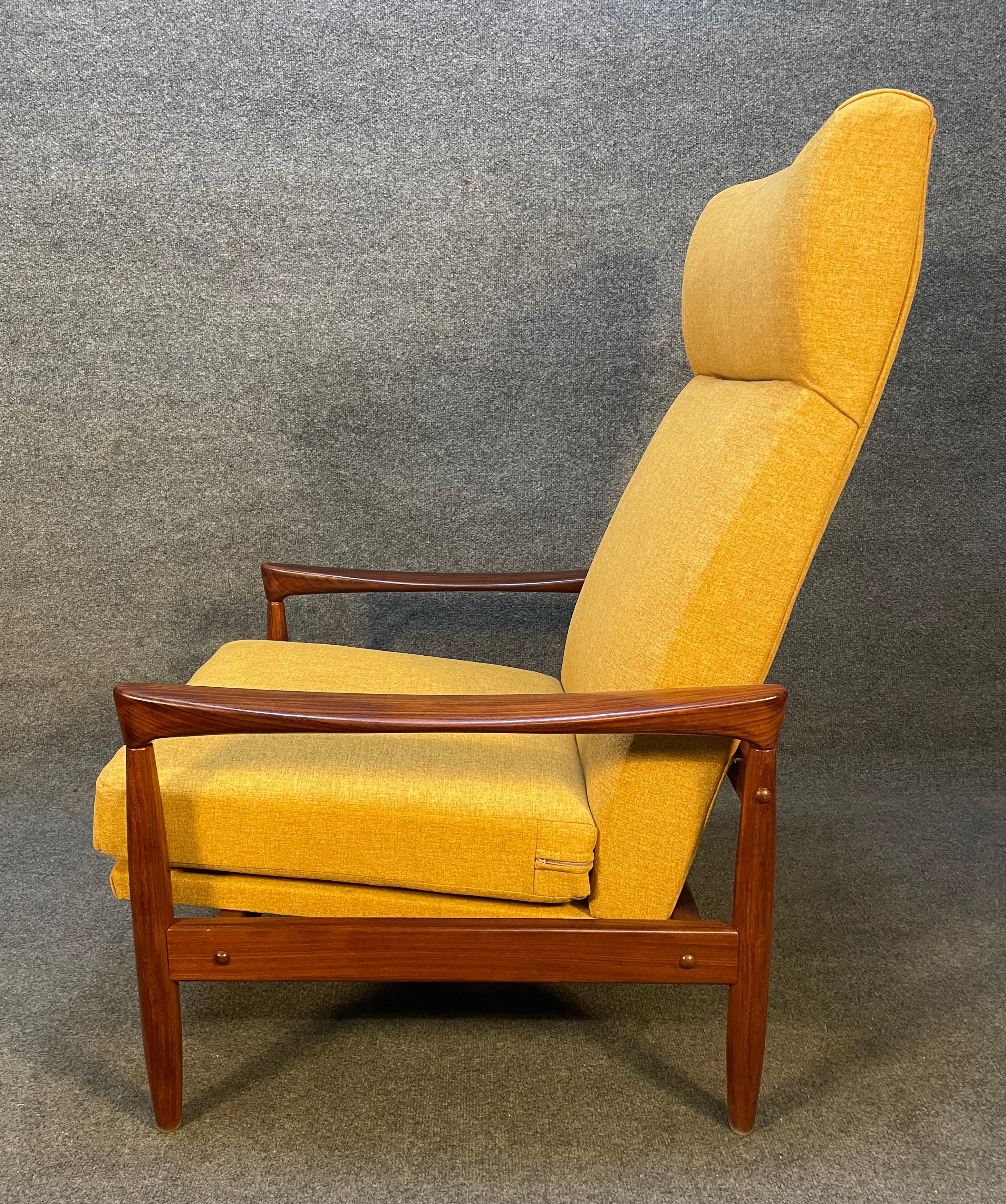 Here is a beautiful Scandinavian modern high back easy chair model 