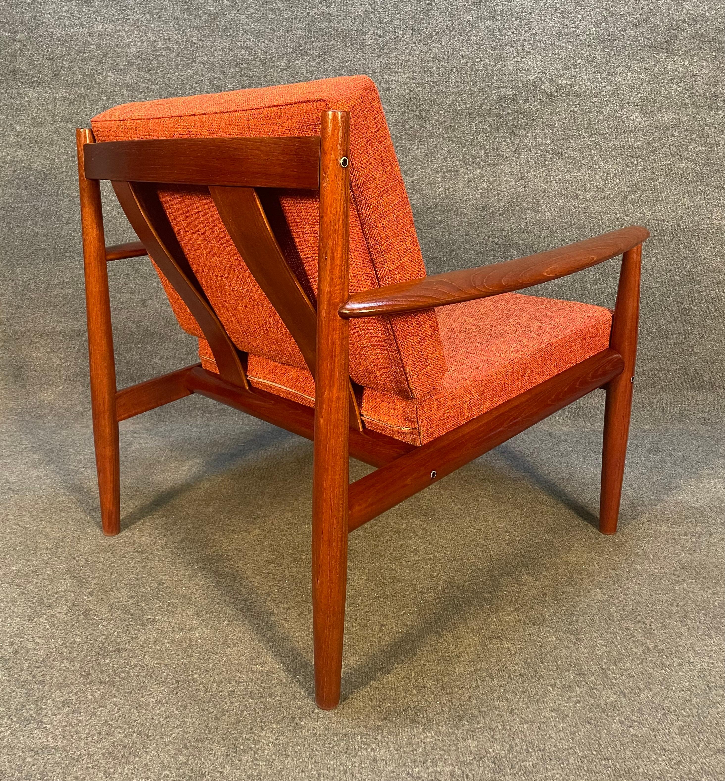 Here is a beautiful Scandinavian modern easy chair in solid teak designed by Grete Jalk and manufactured by France & Son in Denmark in the 1960's.
This comfortable chair, recently imported from Europe to California before its refinishing, features