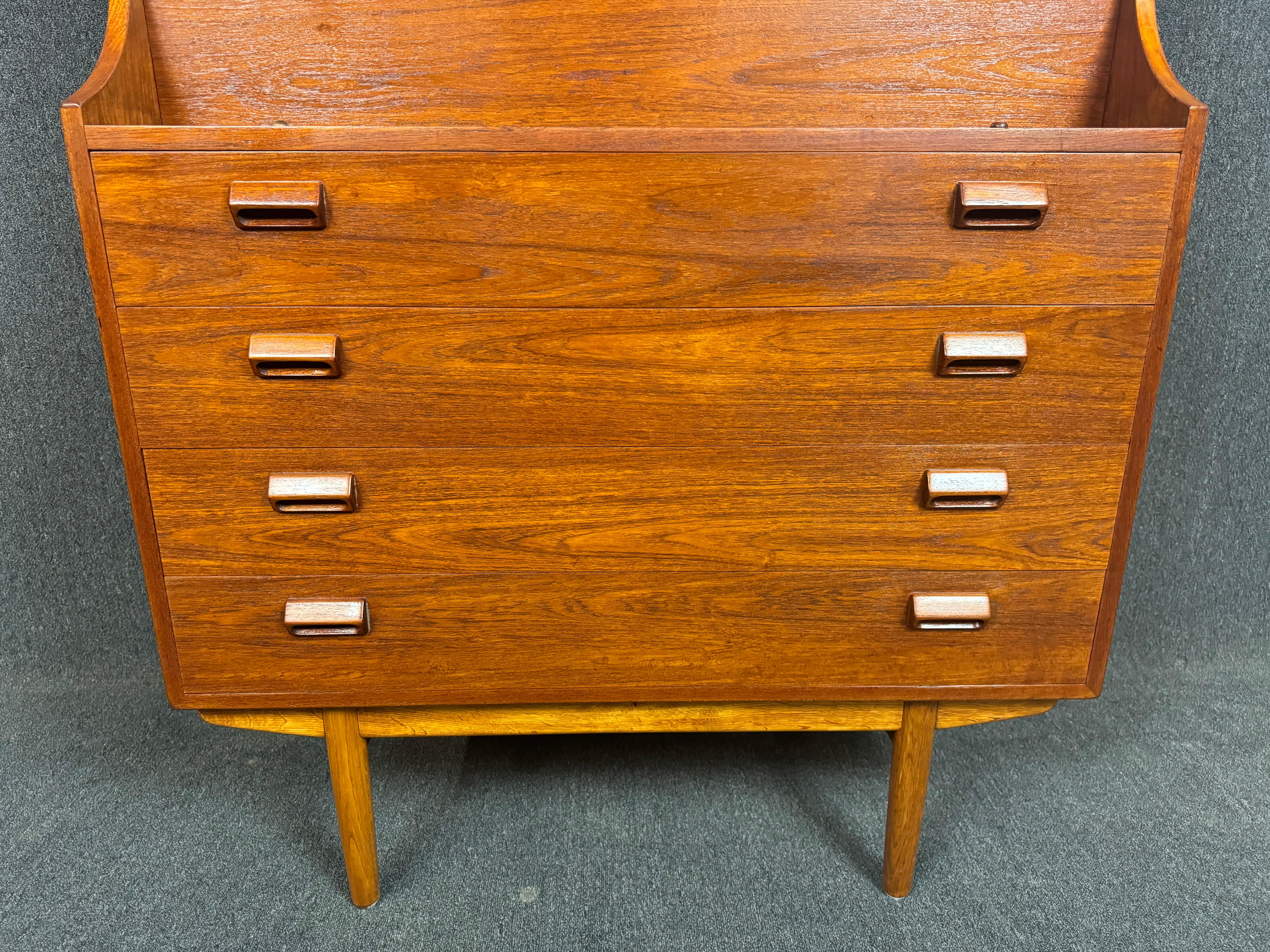 Here is a beautiful scandinavian modern secretary desk in teak designed by master Borge Mogensen and manufactured by Soborg Mobelfabrik in Denmark in the 1960's.
This exquisite piece, recently imported from Europe to California before its
