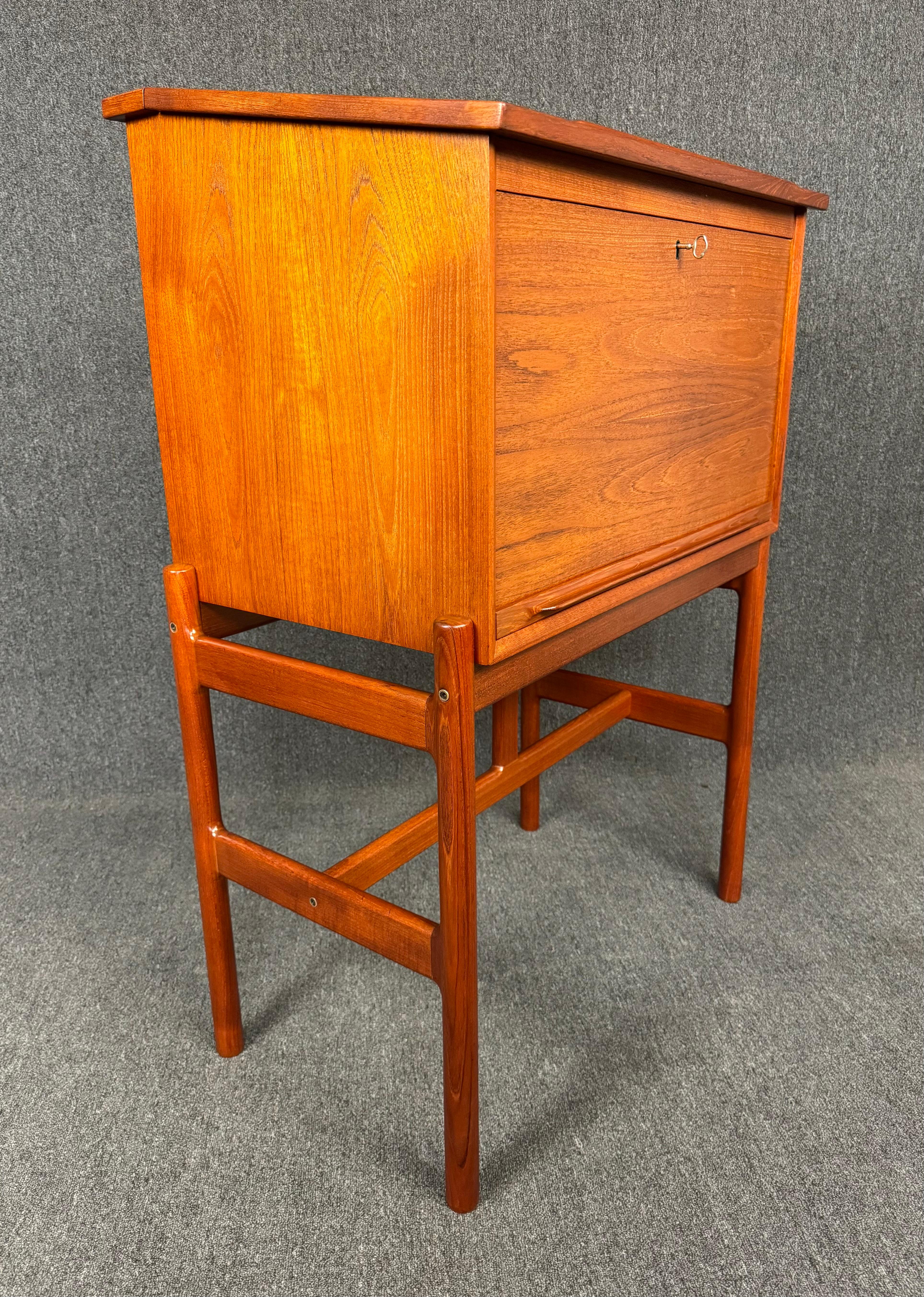 Here is an exquisite scandinavian modern secretary desk 