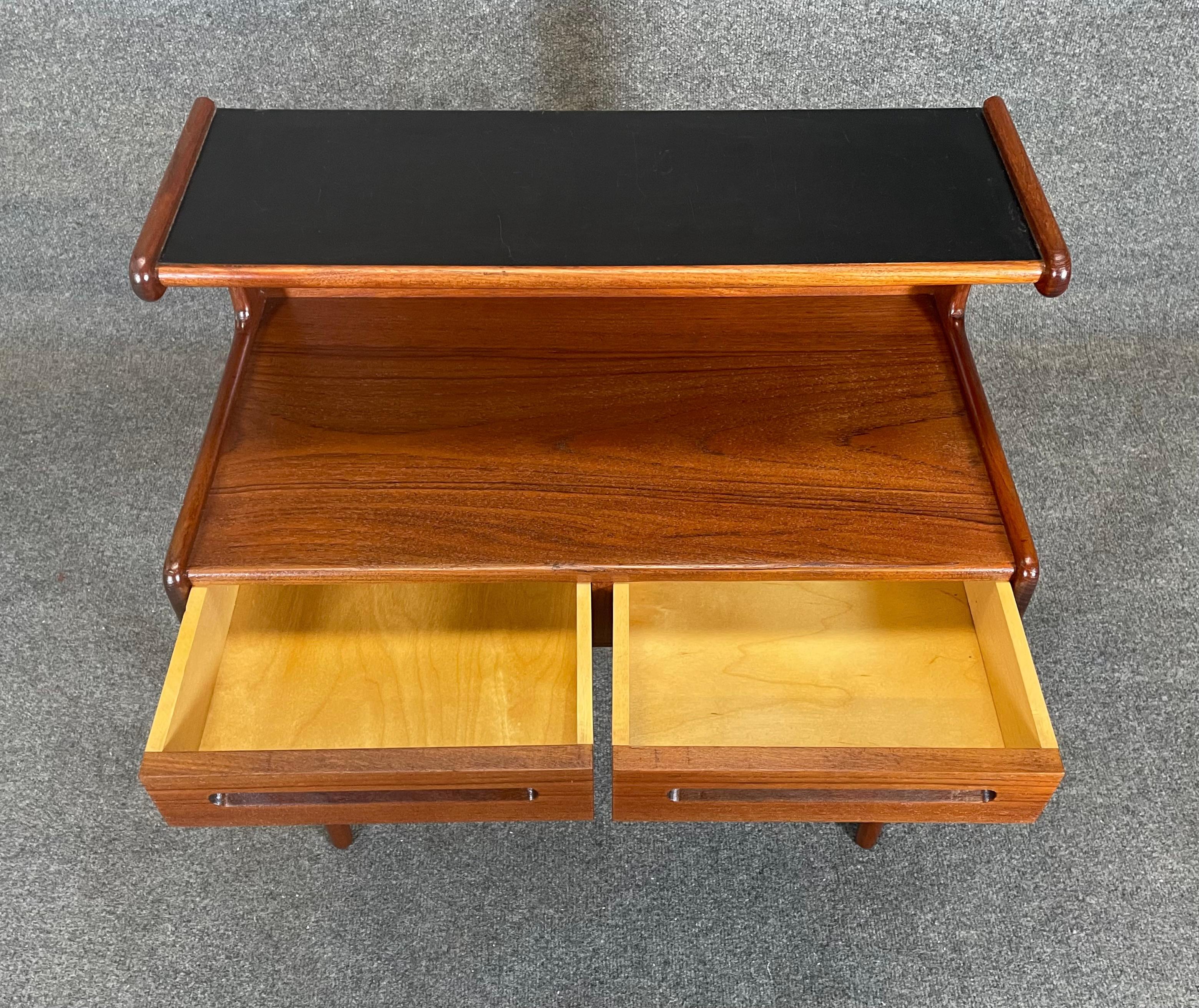 Here is a beautiful scandinavian modern teak versatile side table-nightstand manufactured in Denmark in the 1960's.
This lovely piece, recently imported from Europe to California before its refinishing, features a vibrant wood grain, a top with an