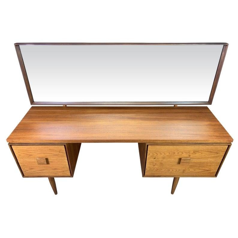 Here is from master Ib Kofod Larsen a beautiful teak vanity/desk from the the acclaimed 