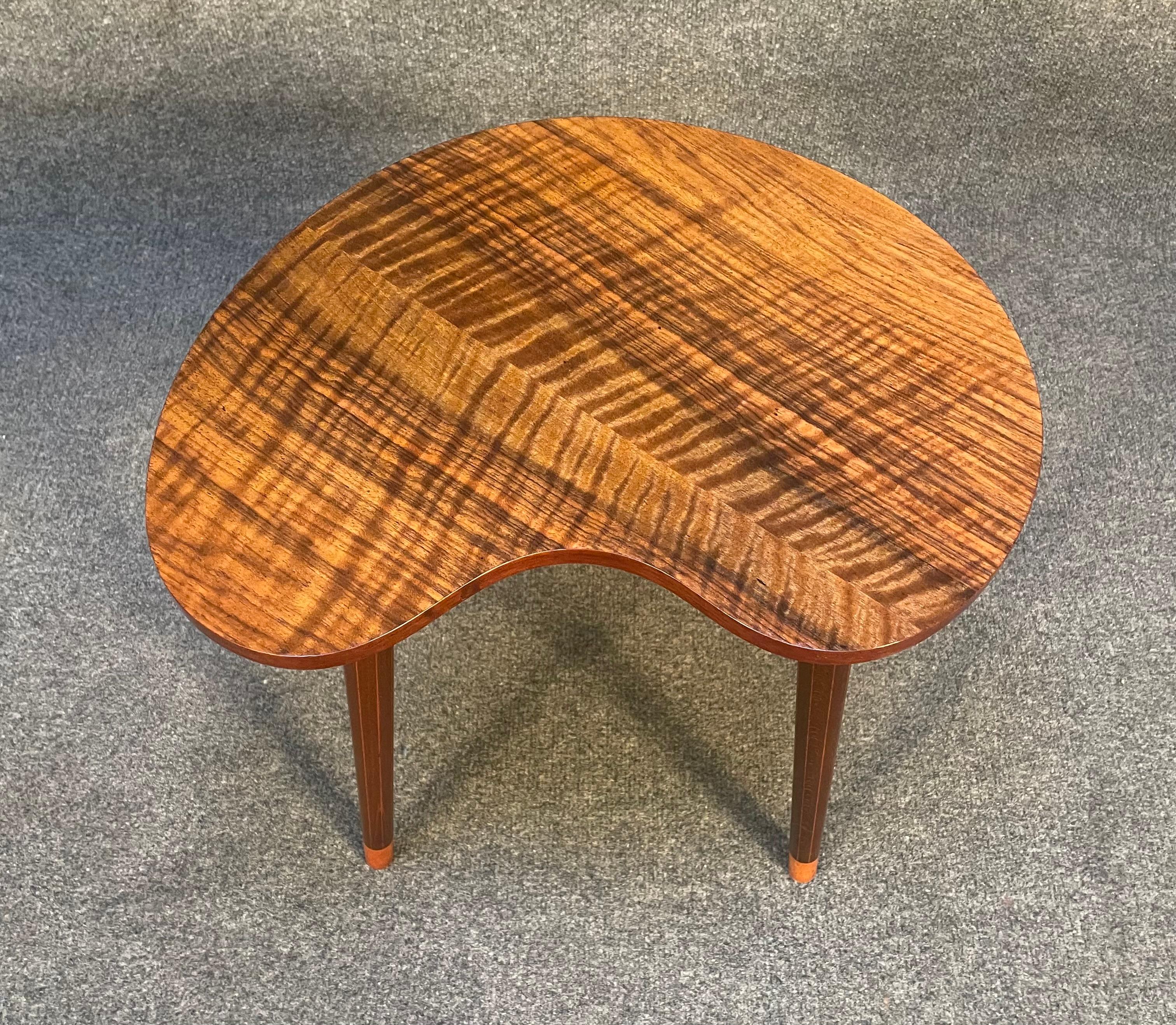Here is a beautiful Scandinavian Modern end table in walnut manufactured by Gorm Mobler in the 1960s in Denmark.
This special side table, recently imported from Europe to California before its refinishing, features amazing grain details on its