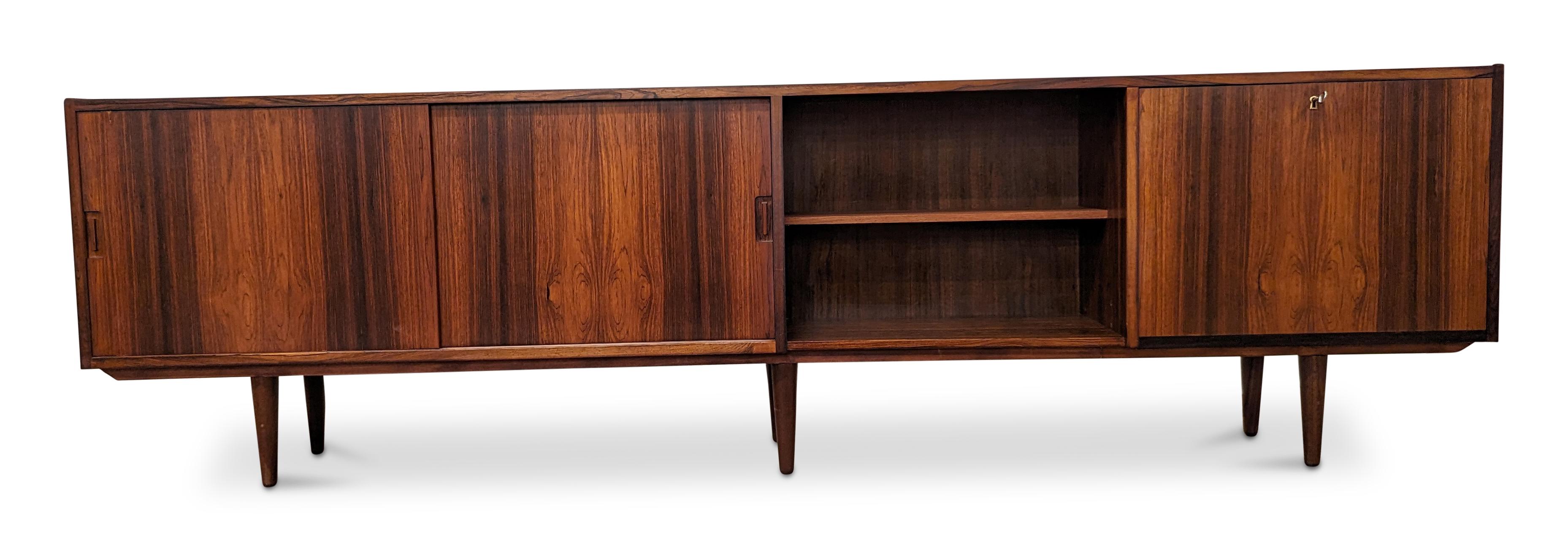 Vintage Danish mid-century modern, made in the 1950's - Recently refurbished

Brazilian rosewood have been illegal to harvest since 1961 and on the U.N. CITES list of endangered spices since 1992. For each piece of rosewood furniture we import to