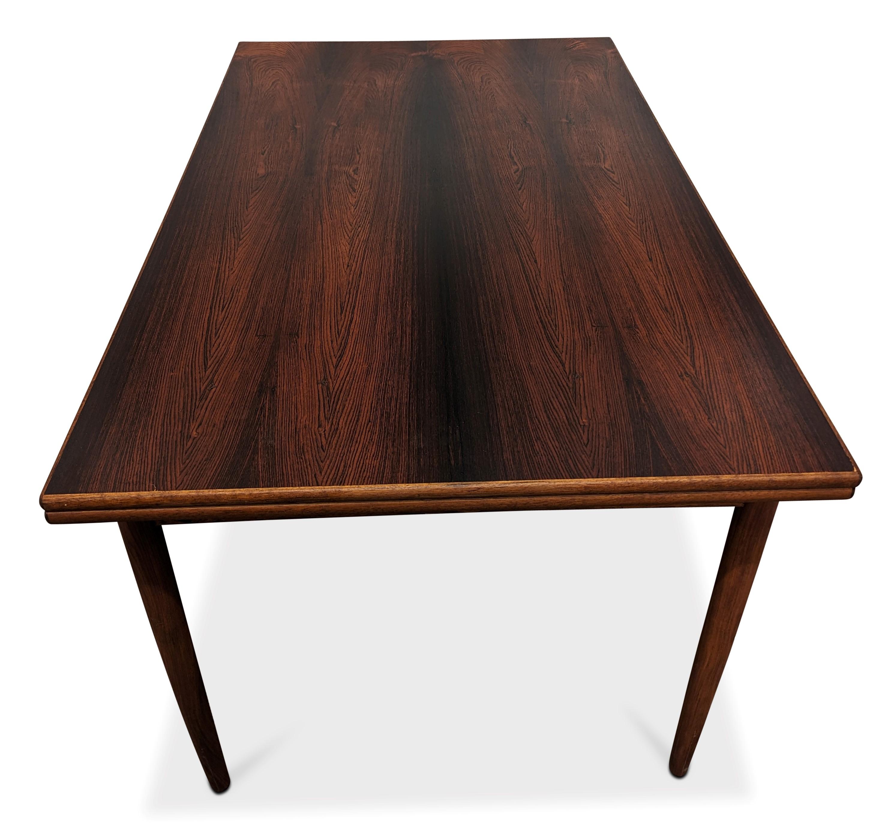 Vintage Danish Mid-Century Modern, made in the 1950s - Recently refurbished

Brazilian rosewood have been illegal to harvest since 1961 and on the U.N. CITES list of endangered spices since 1992. For each piece of rosewood furniture we import to