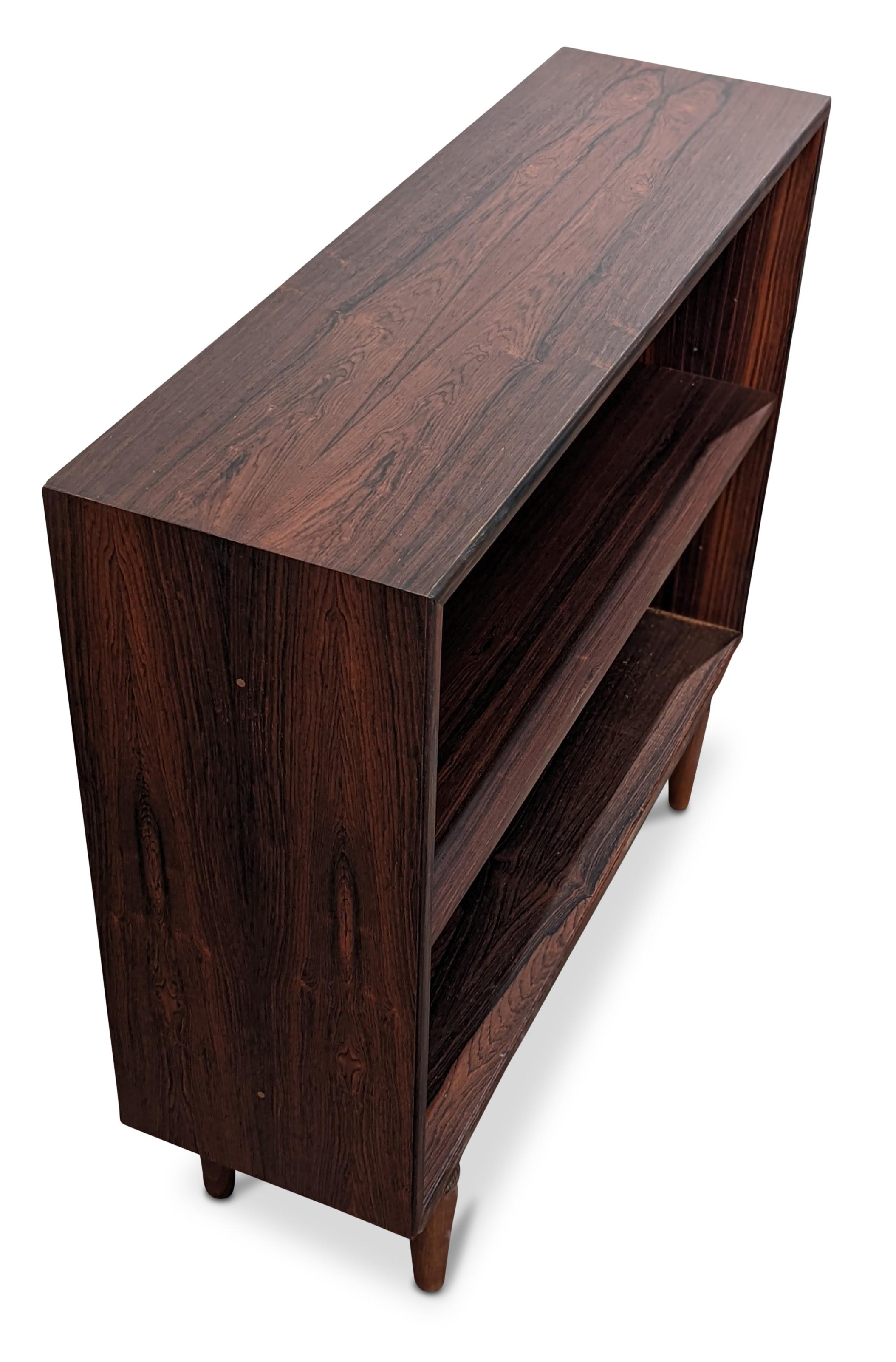 Vintage Danish Mid-Century Modern, made in the 1950's - Recently refurbished

Brazilian rosewood have been illegal to harvest since 1961 and on the U.N. CITES list of endangered spices since 1992. For each piece of rosewood furniture we import to