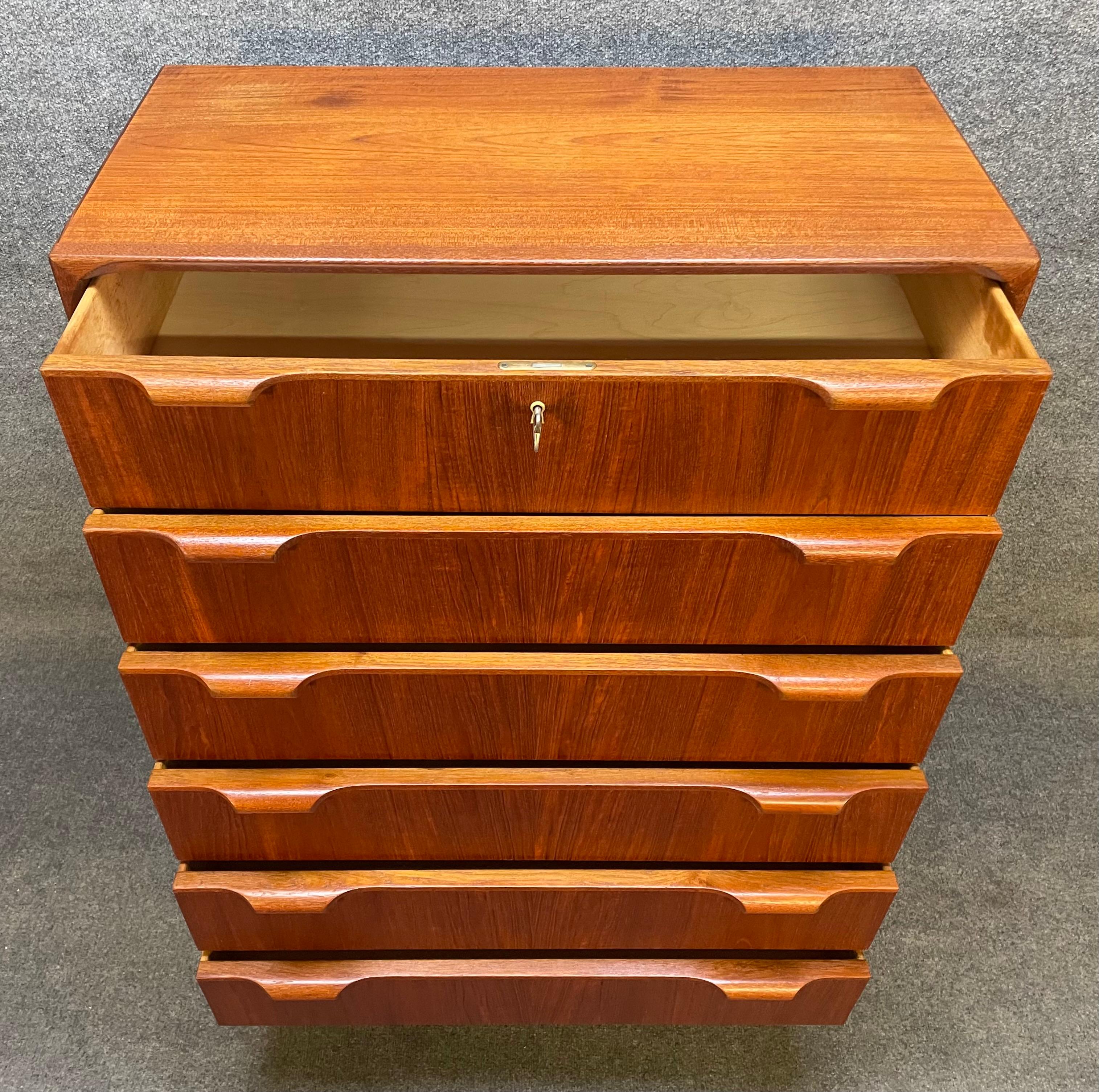 Here is a beautiful Scandinavian modern dresser in teak wood manufactured by Bernhard Pedersen Mobelfabrik in Denmark in the 1960's.
This beautiful chest of drawers, recently imported from Europe to California before its refinishing, features a
