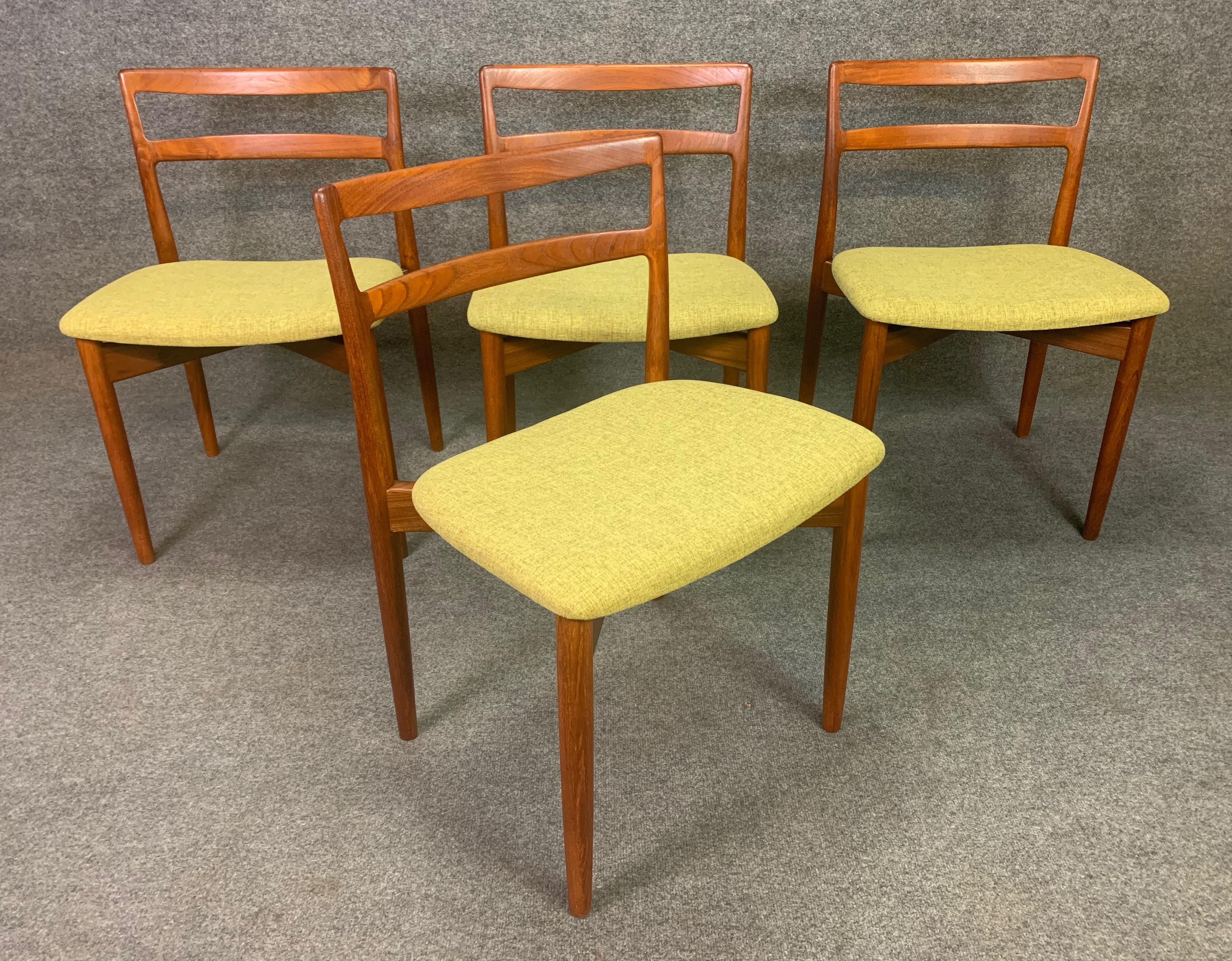 Here is a beautiful Scandinavian Modern set of four dining chairs 