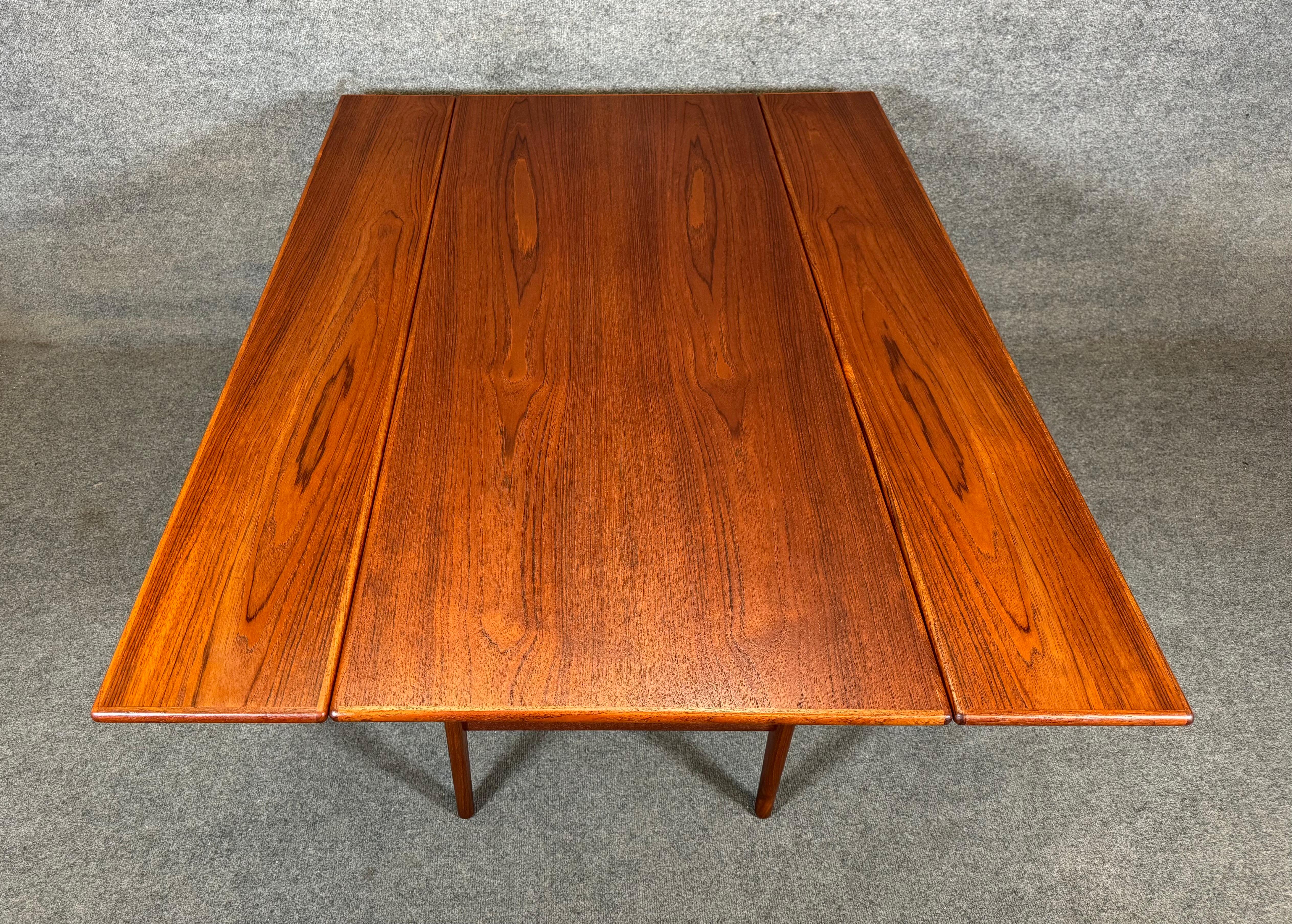 Here is a beautiful and clever scandinavian modern elevator coffee-dining table in teak designed by Kai Kristiansen and manufactured by Vildbjerg Møbelfabrik in Denmark in the 1960's.
This exquisite table, recently imported from Europe to California