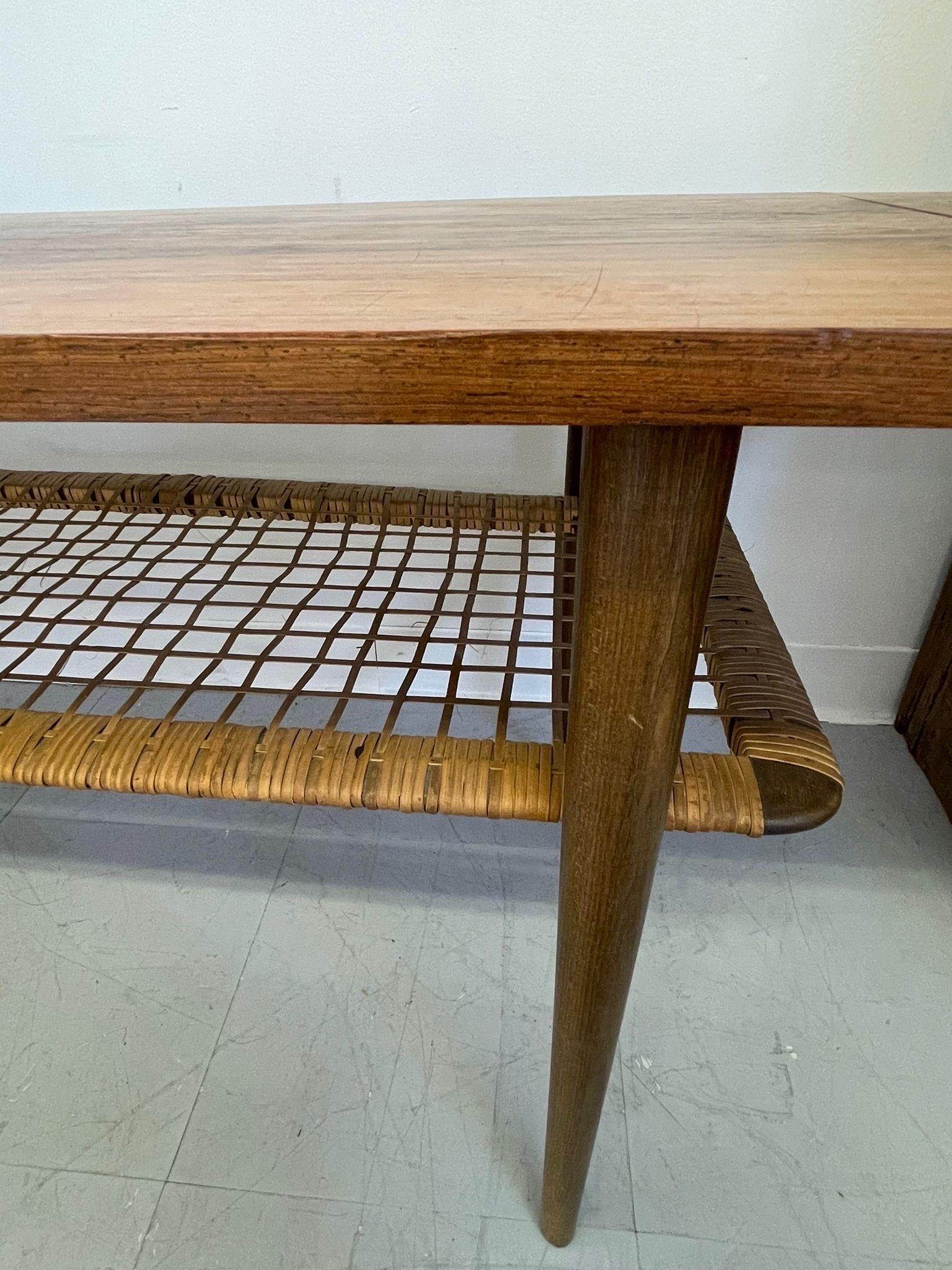 Late 20th Century Vintage Danish Modern Coffee Table With Ornate Rosewood Grain and Wicker Shelf For Sale