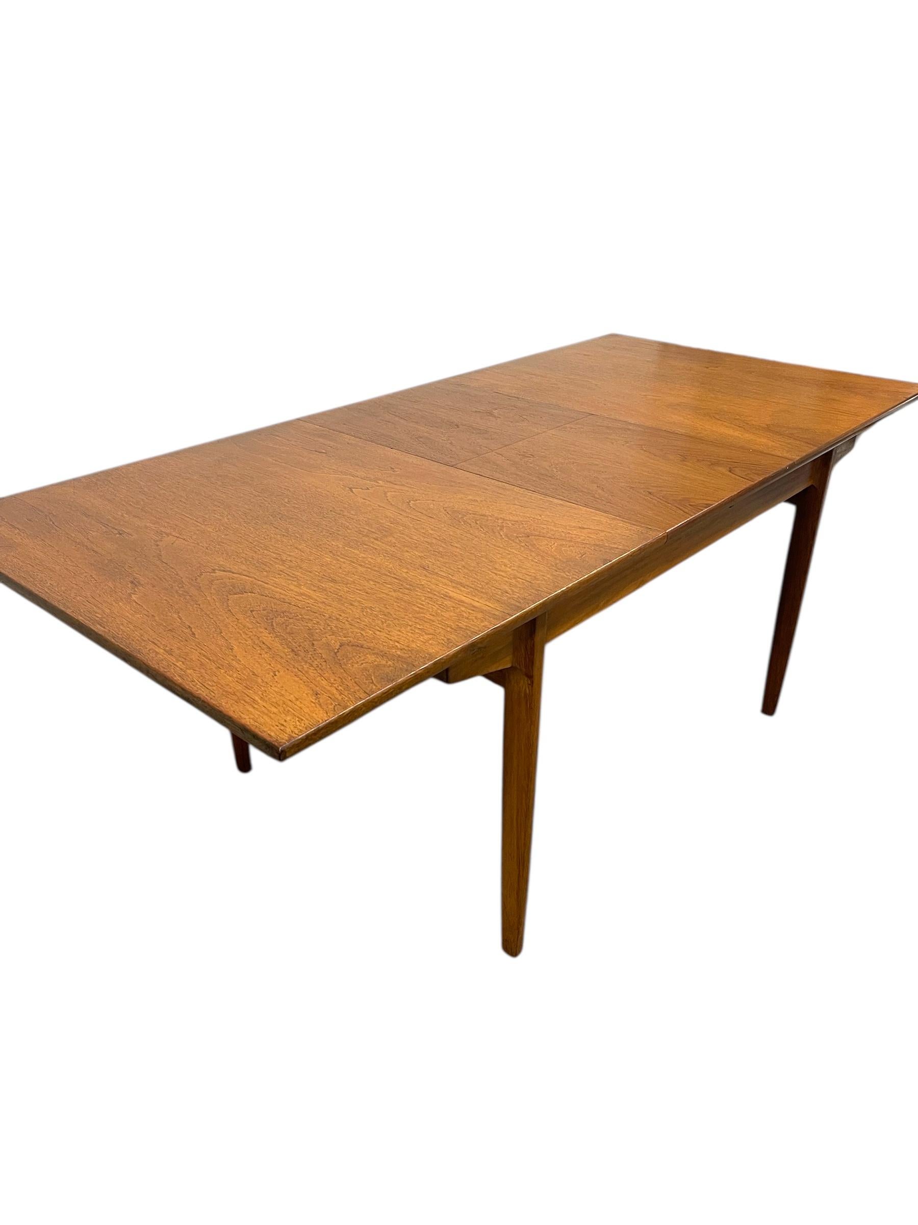 Mid-Century Modern Vintage Danish Modern Expanding Dining Table with Self-storing Leaf For Sale