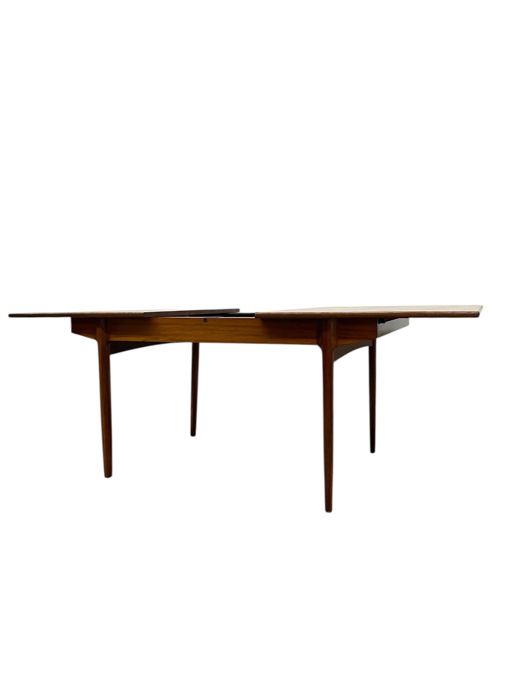 Late 20th Century Vintage Danish Modern Expanding Dining Table with Self-storing Leaf For Sale