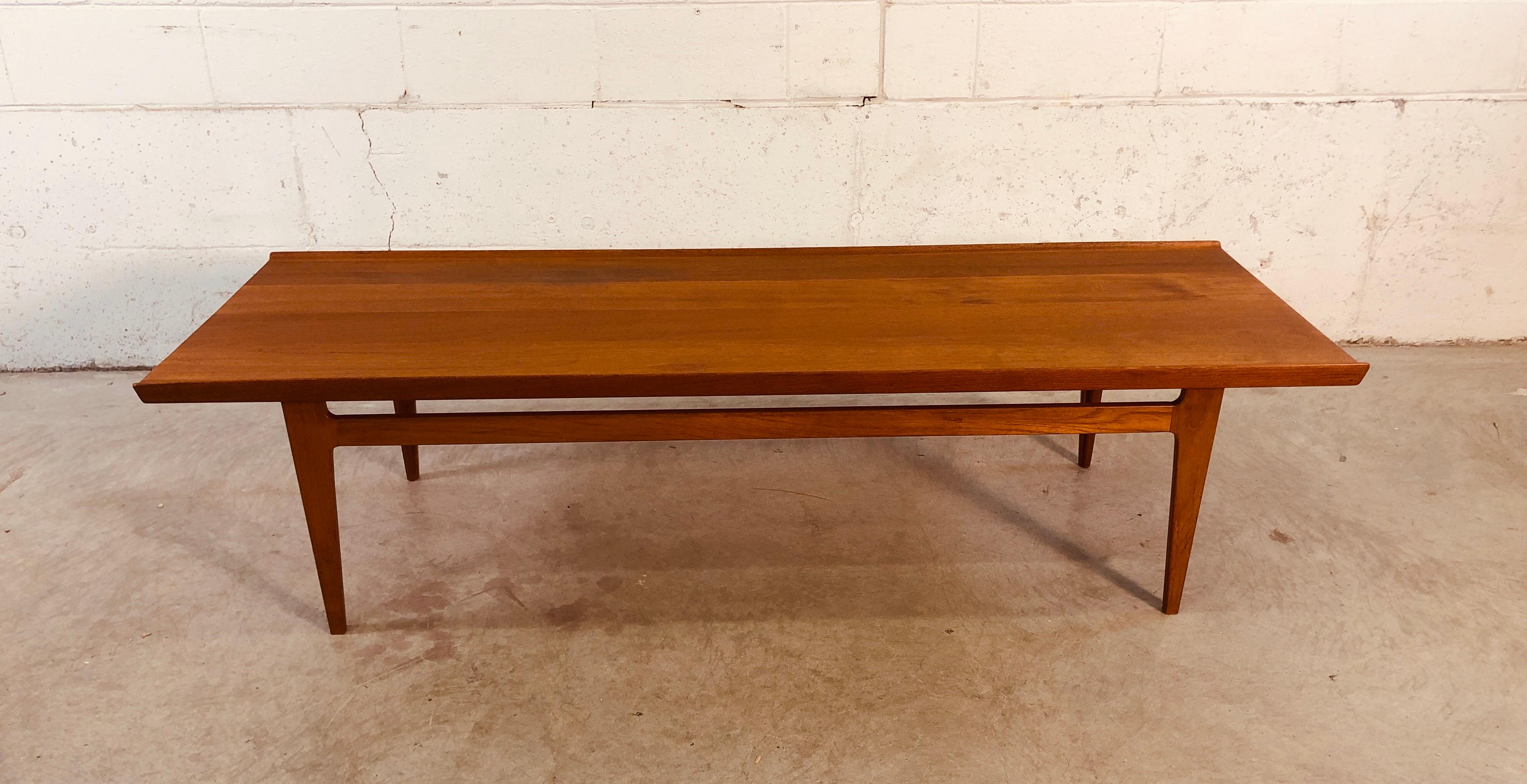 Vintage Danish modern Finn Juhl for France & Sons 532 solid teak long coffee table with raised edges. Table is in excellent refinished condition. Marked underneath.