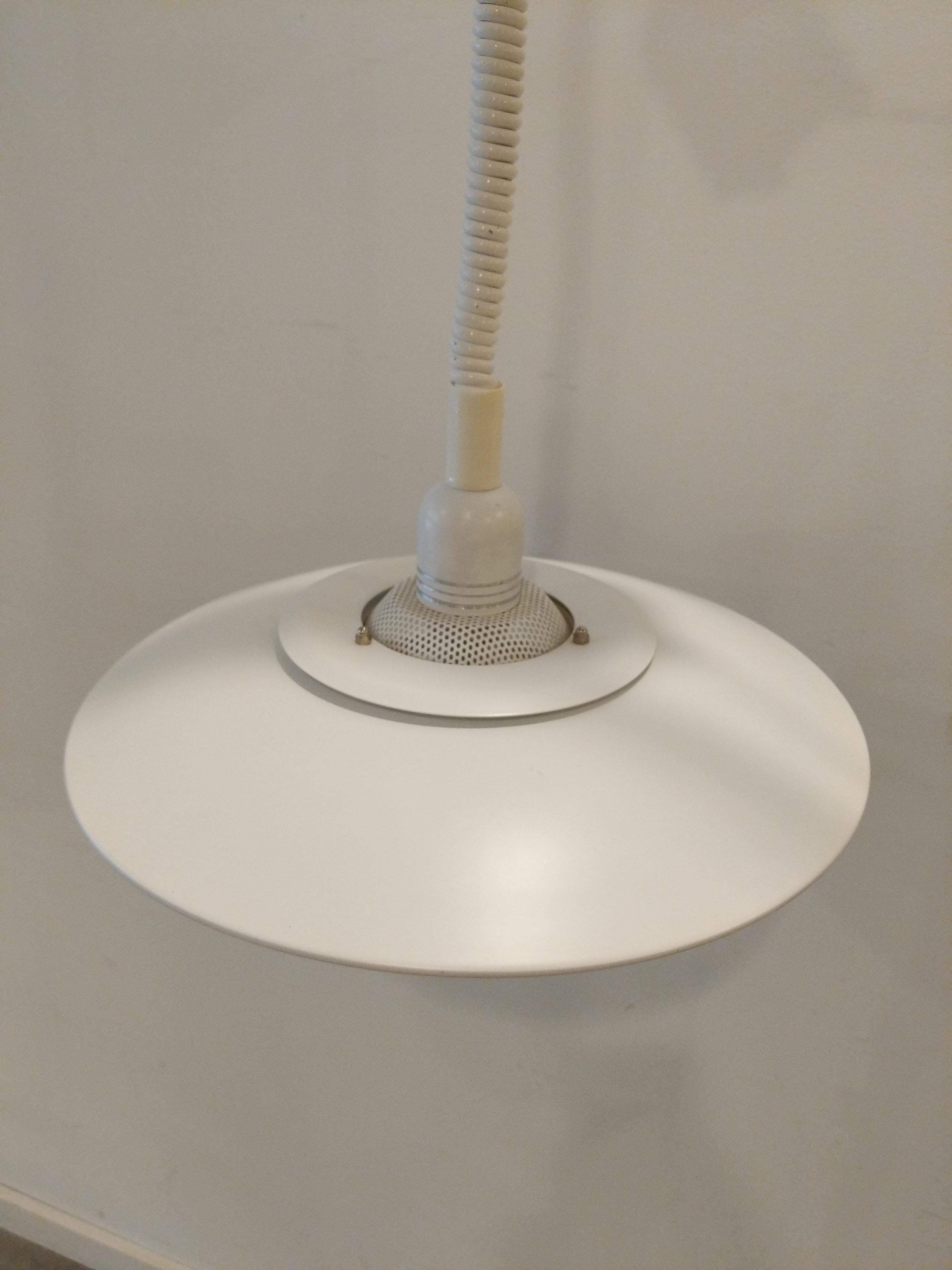 Authentic vintage mid century Danish / Scandinavian Modern hanging lamp / ceiling lamp / pendant light.

With adjustable-height 
