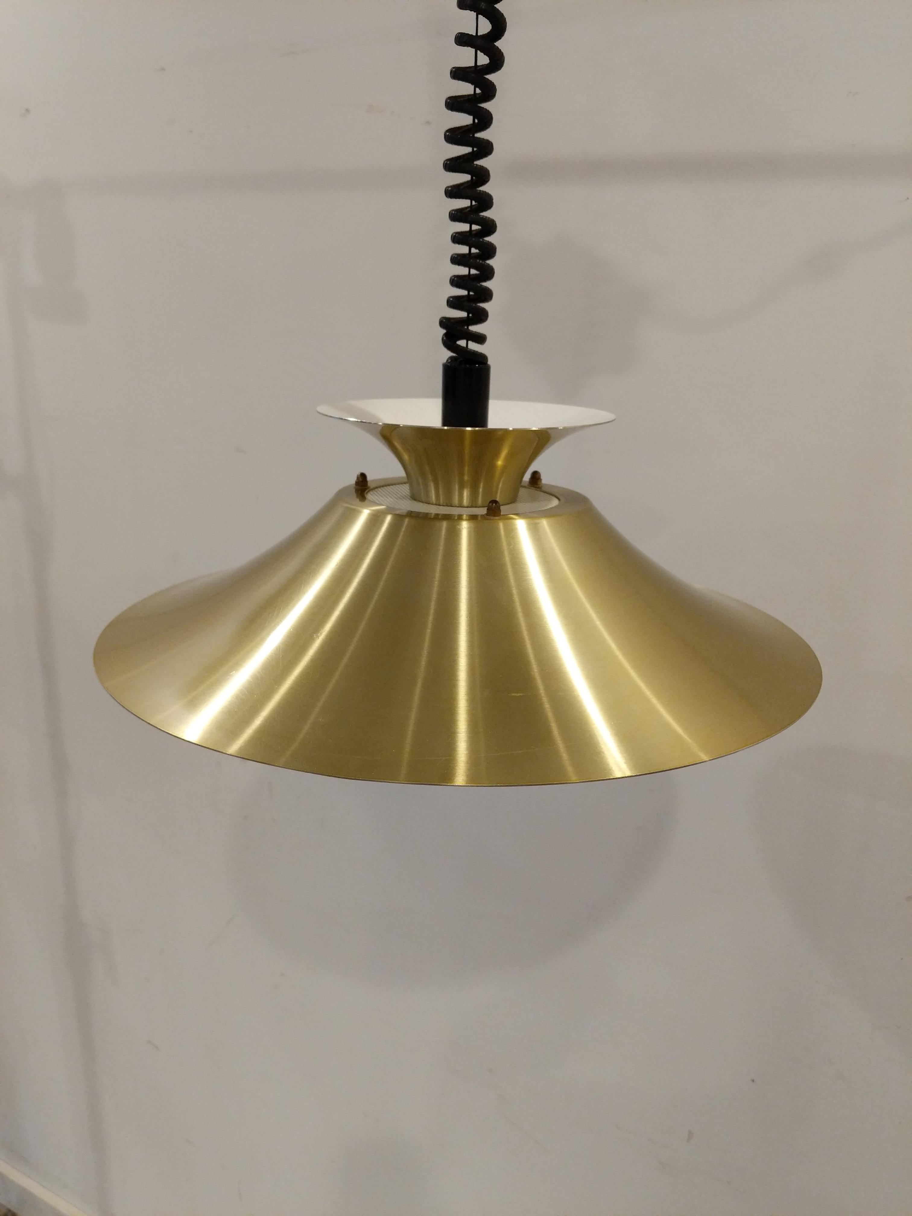 Authentic vintage mid century Danish / Scandinavian Modern hanging lamp / ceiling lamp / pendant light.

Imported directly from Denmark, this lamp is in great shape overall with minor wear from age (see photos).

The lamp is metal.

Dimensions:
16”