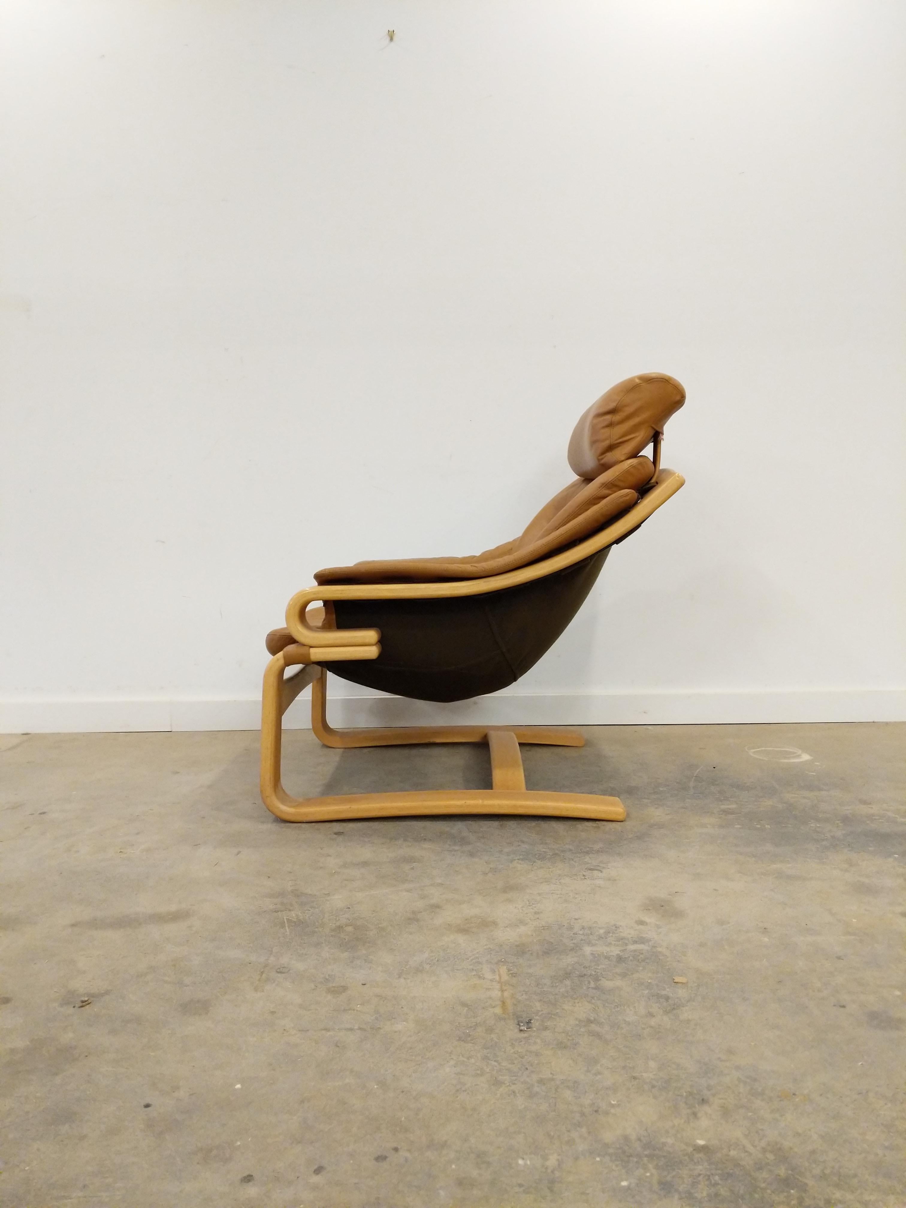 Authentic vintage mid century Danish / Scandinavian Modern lounge chair / recliner with footstool.

