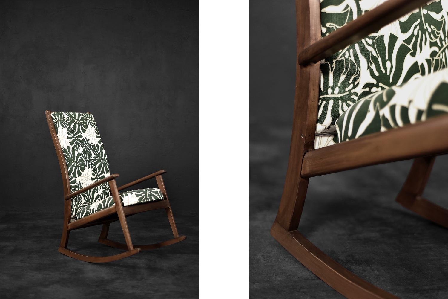 This high rocking chair was made in Denmark during the 1960s. The frame is made of wood in a dark shade of brown. The seat and backrest are upholstered with high-quality gabardine with a fashionable pattern of Monstera deliciosa leaves. It is a