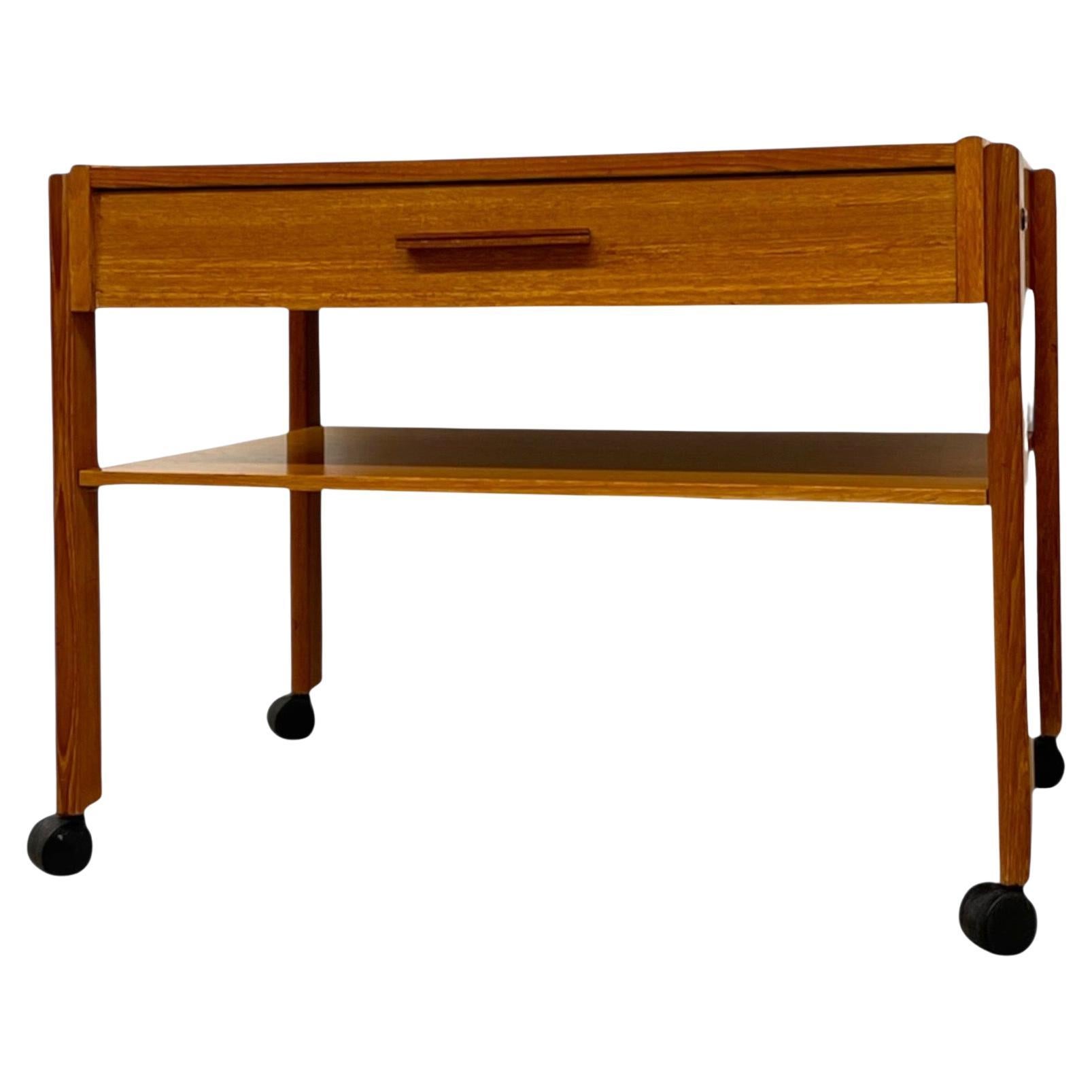 Vintage Danish Modern Rolling Side Table with Drawer and Lower Shelf For Sale