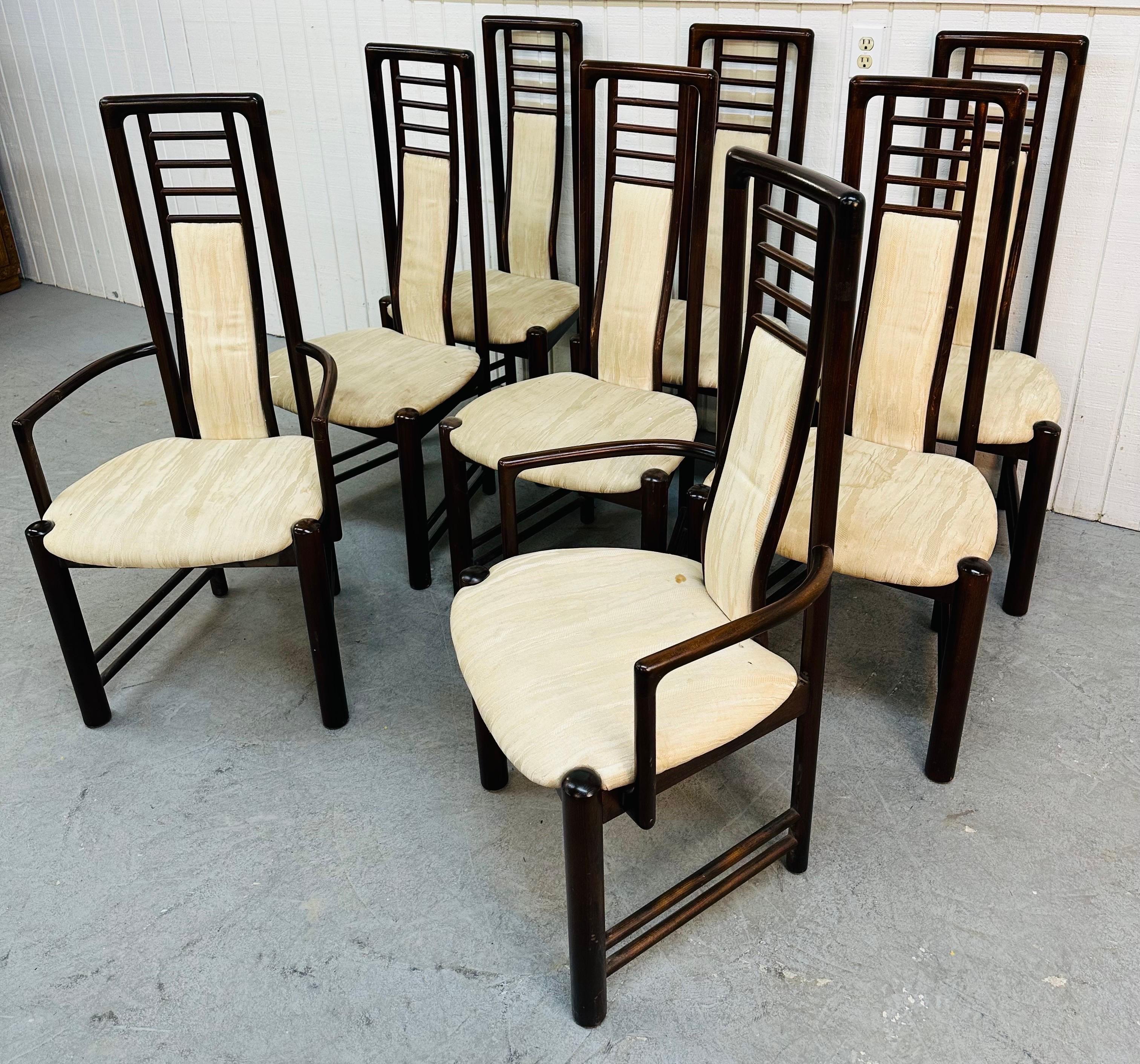 This listing is for a set of eight vintage Danish Modern Rosewood Dining Chairs. Featuring two arm chairs, six straight chairs, high back design, upholstered seats and back rests. This is an exceptional combination of quality and design!
