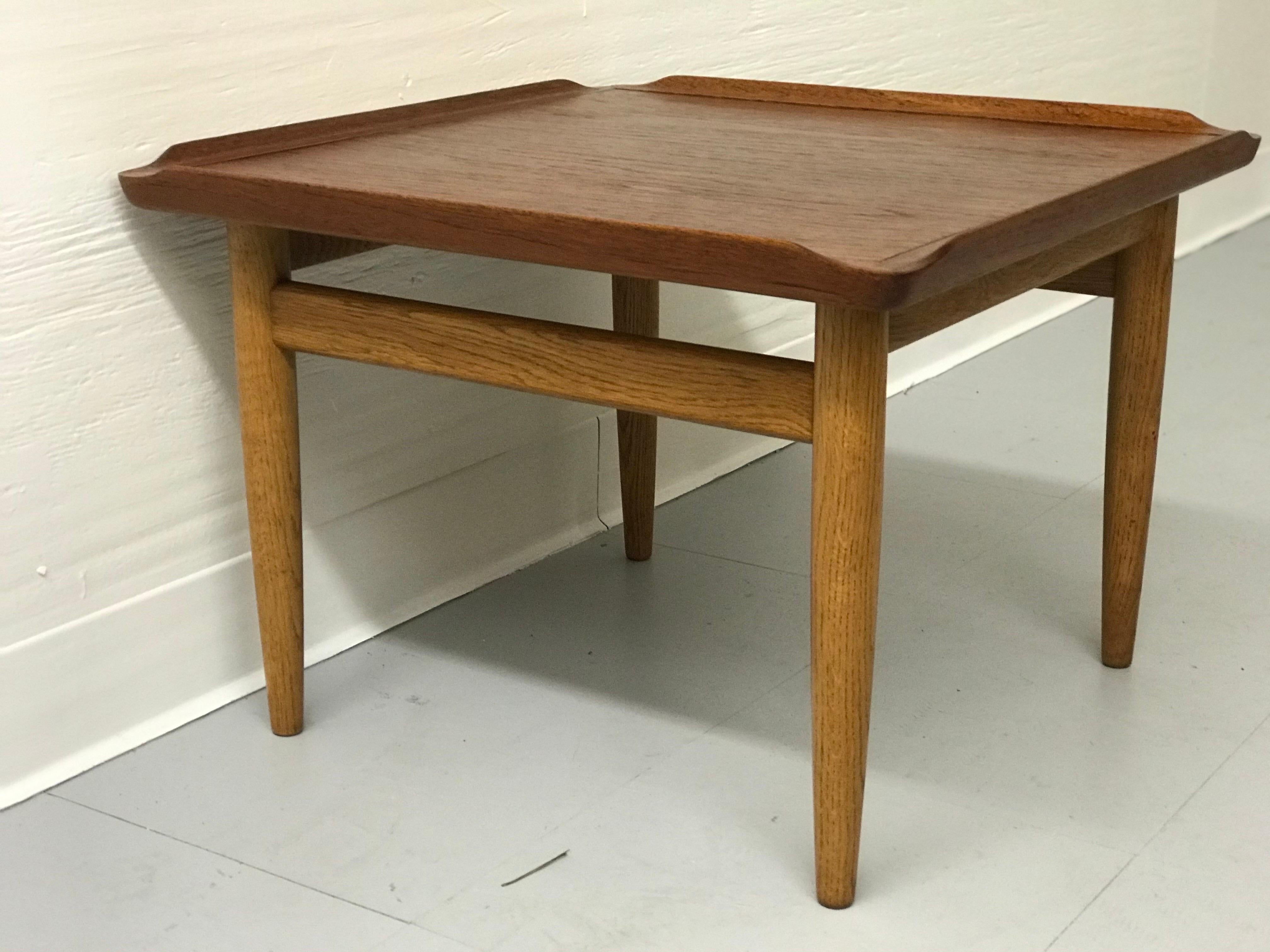 Vintage Danish modern table.

Dimensions: 22 W ; 15 1/2 H ; 22 D.