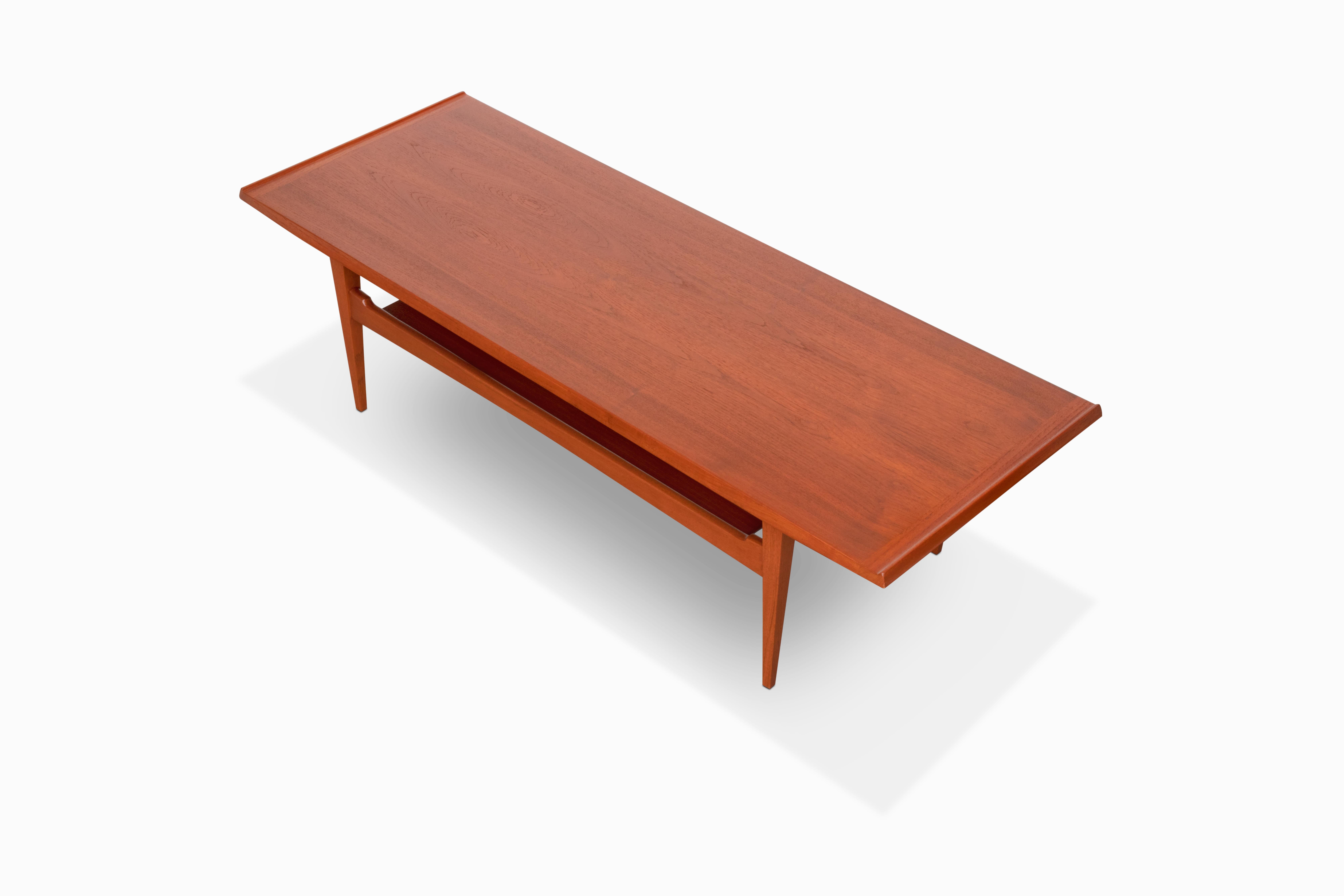 Mid-Century Modern Vintage Danish Modern Teak Coffee Table by Moreddi For Sale