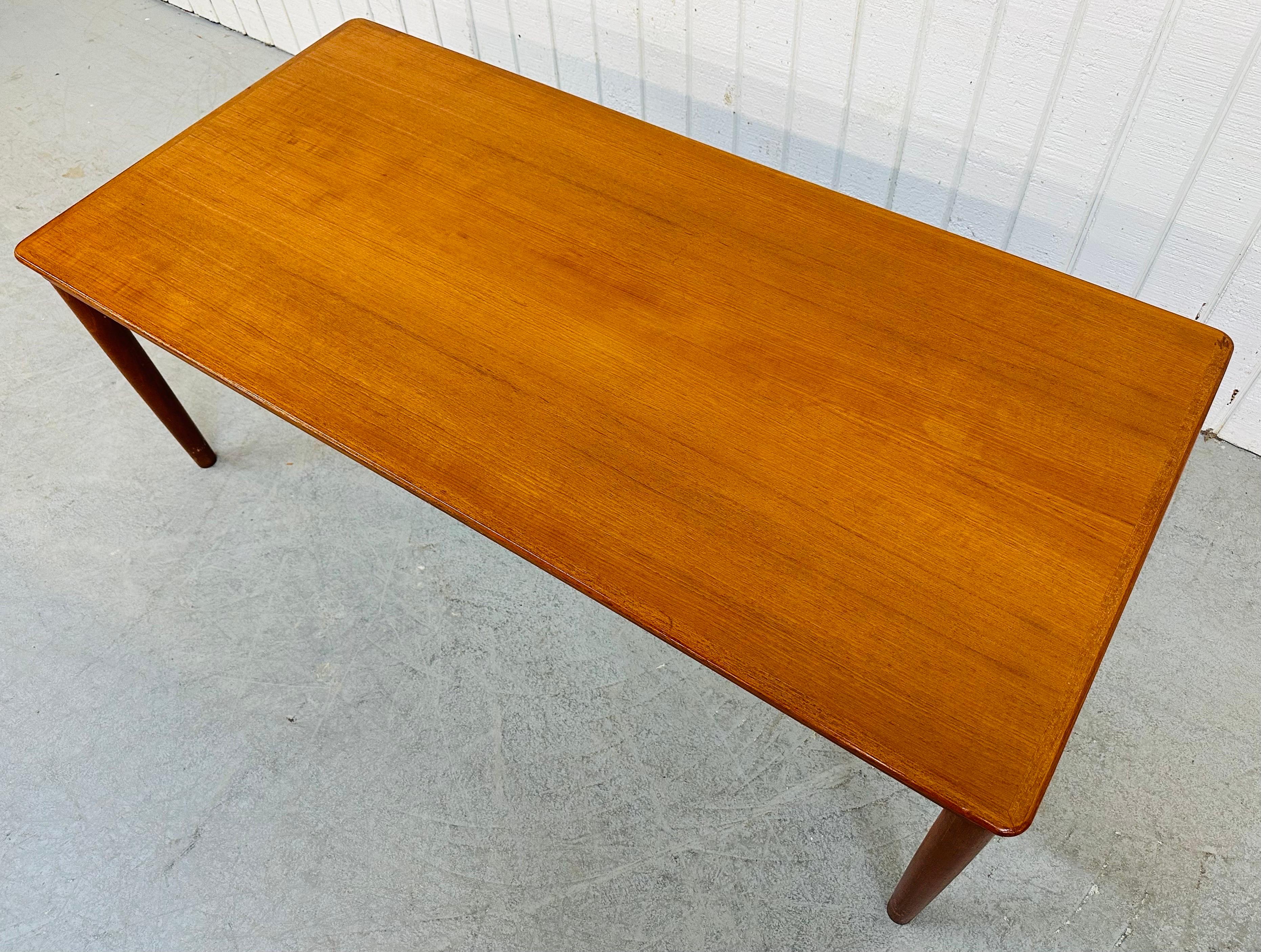 This listing is for a vintage Danish Modern Teak Coffee Table. Featuring a rectangular top, four removable legs, and a beautiful teak finish. This is an exceptional combination of quality and design by Vejle Stole.