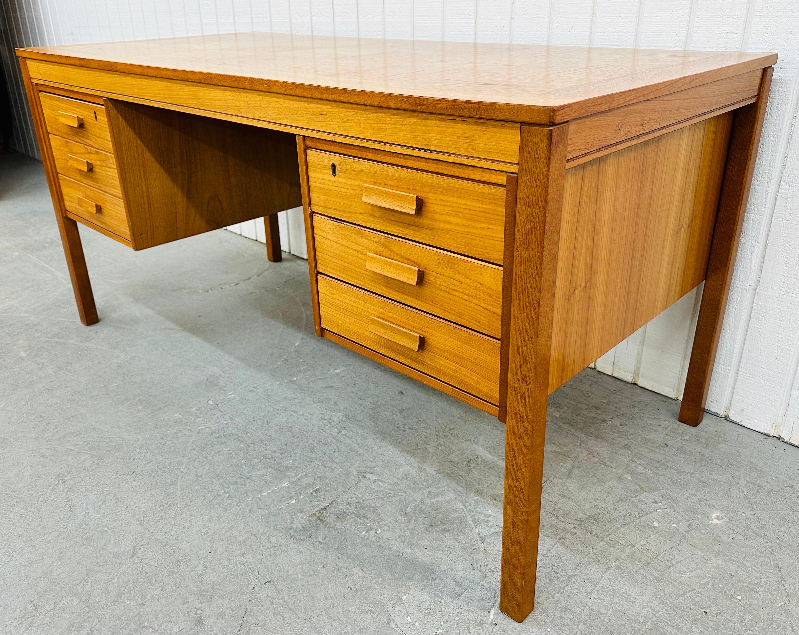 This listing is for a vintage Danish Modern Teak Desk. Featuring a straight line design, checkerboard top, large filing cabinet drawer, three smaller drawers for storage, original teak pulls, a finished backside, and a beautiful teak finish! This is