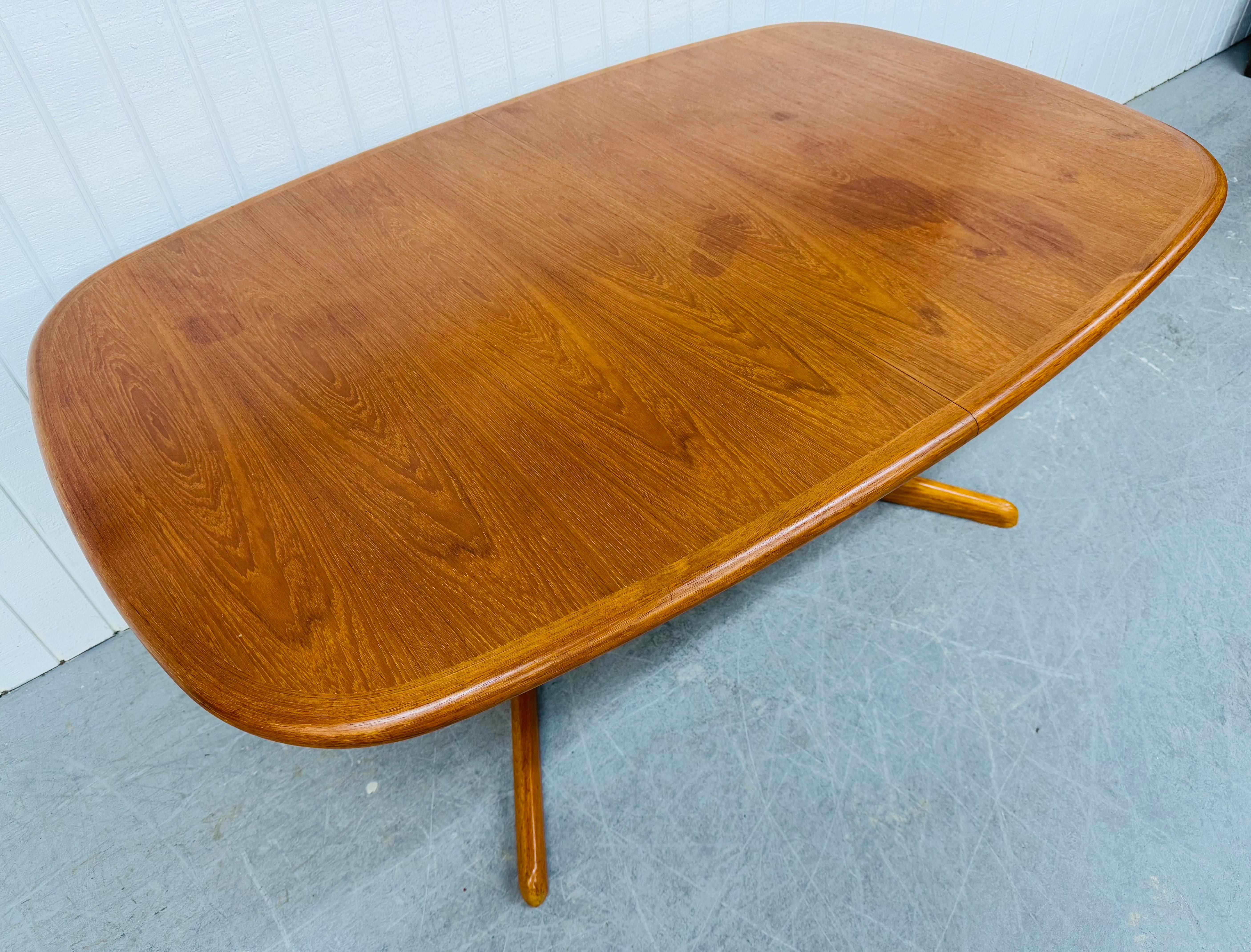 This listing is for a Vintage Danish Modern Teak Dining Table. Featuring an oval top design, pedestal base, two 19” leaves that expand the table up to 102” L, and an original finish. This is an exceptional combination of quality and Danish