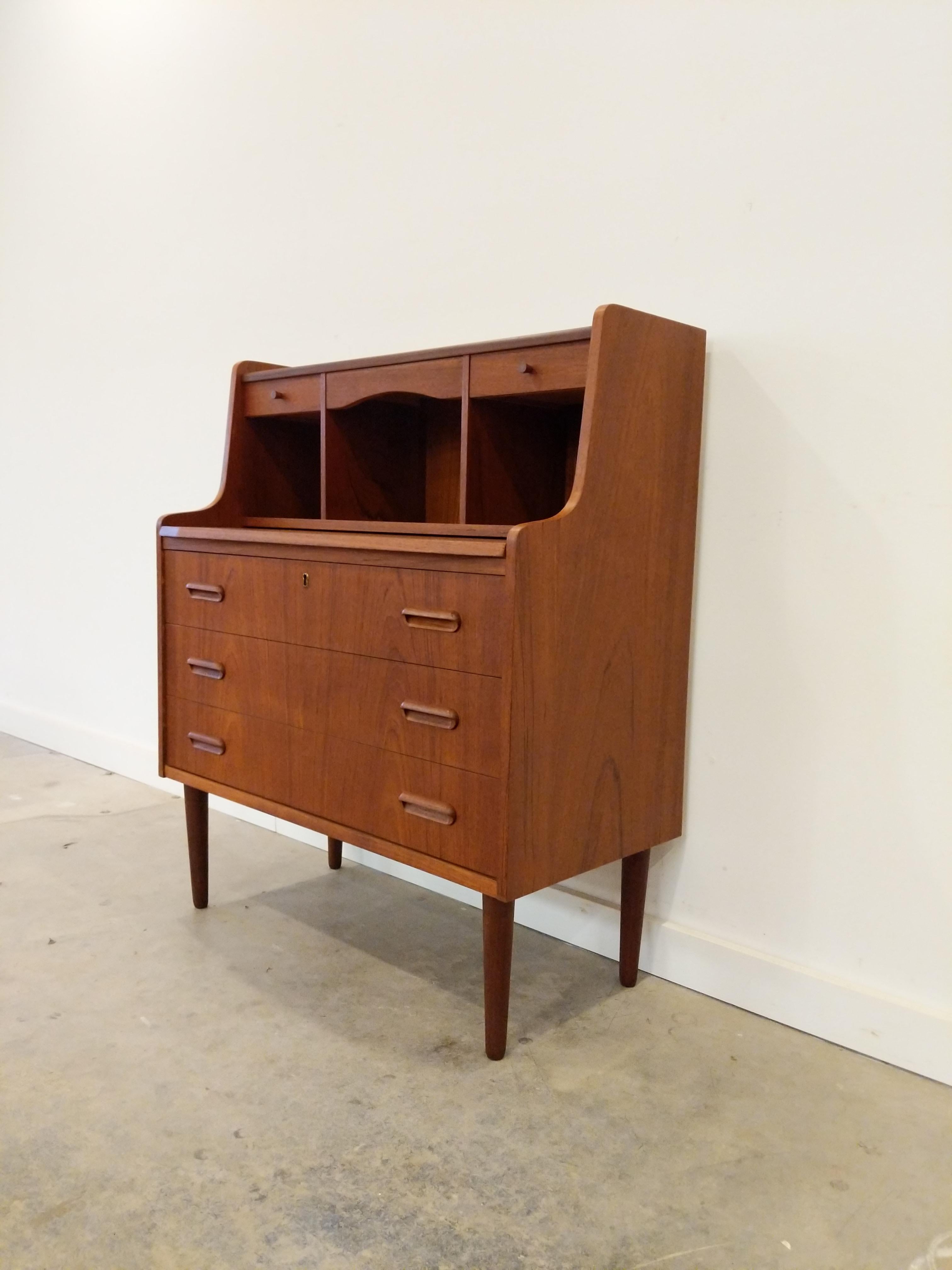 Authentic vintage mid century Danish / Scandinavian Modern teak secretary desk / dresser / chest of drawers / vanity with mirror.

**Mirror has some tarnish**

This piece is in excellent refinished condition with very few signs of age-appropriate