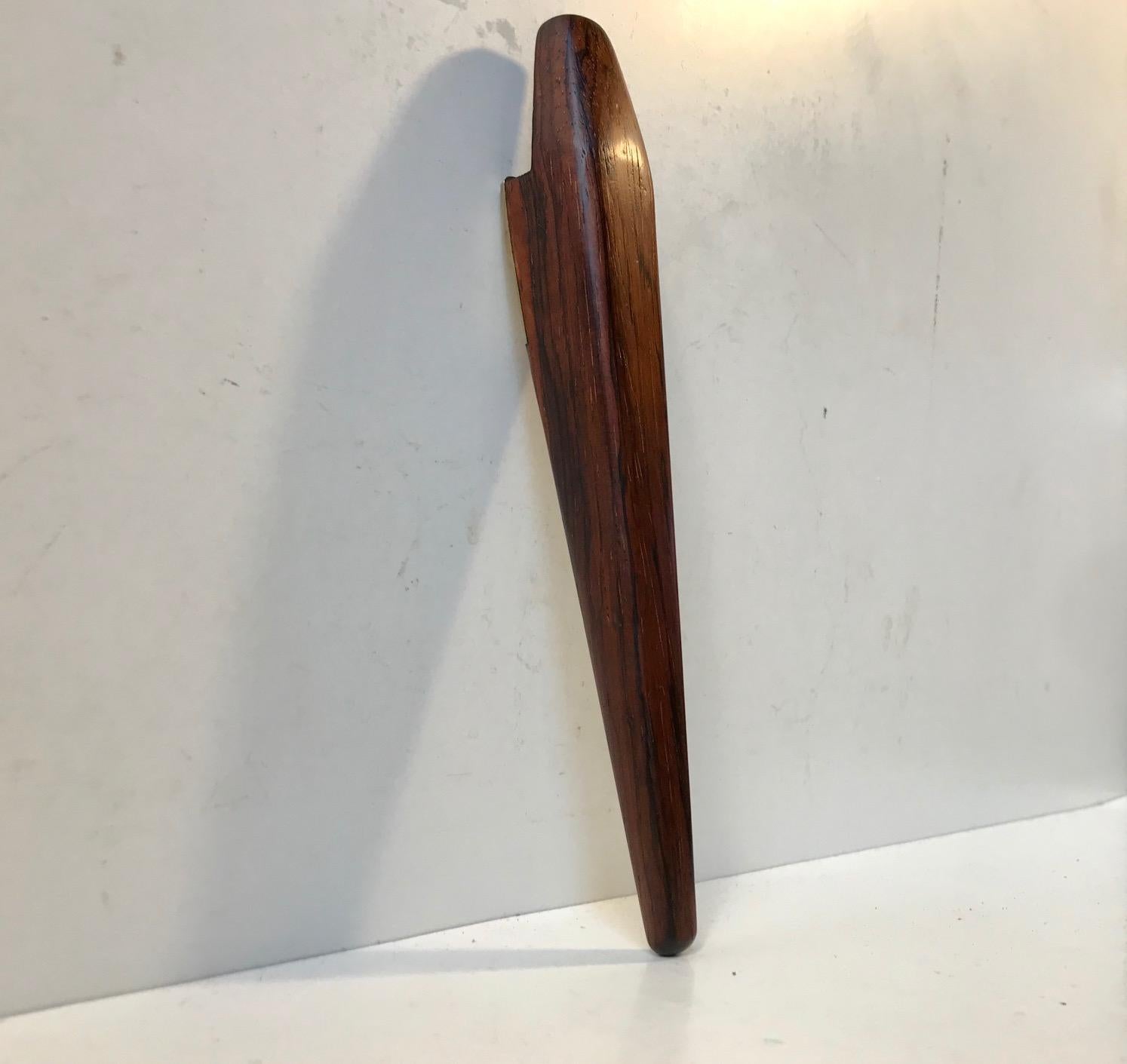 High quality handmade nutcracker in rosewood and brass. Designed by Poul Knudsen in Denmark during the 1960s.