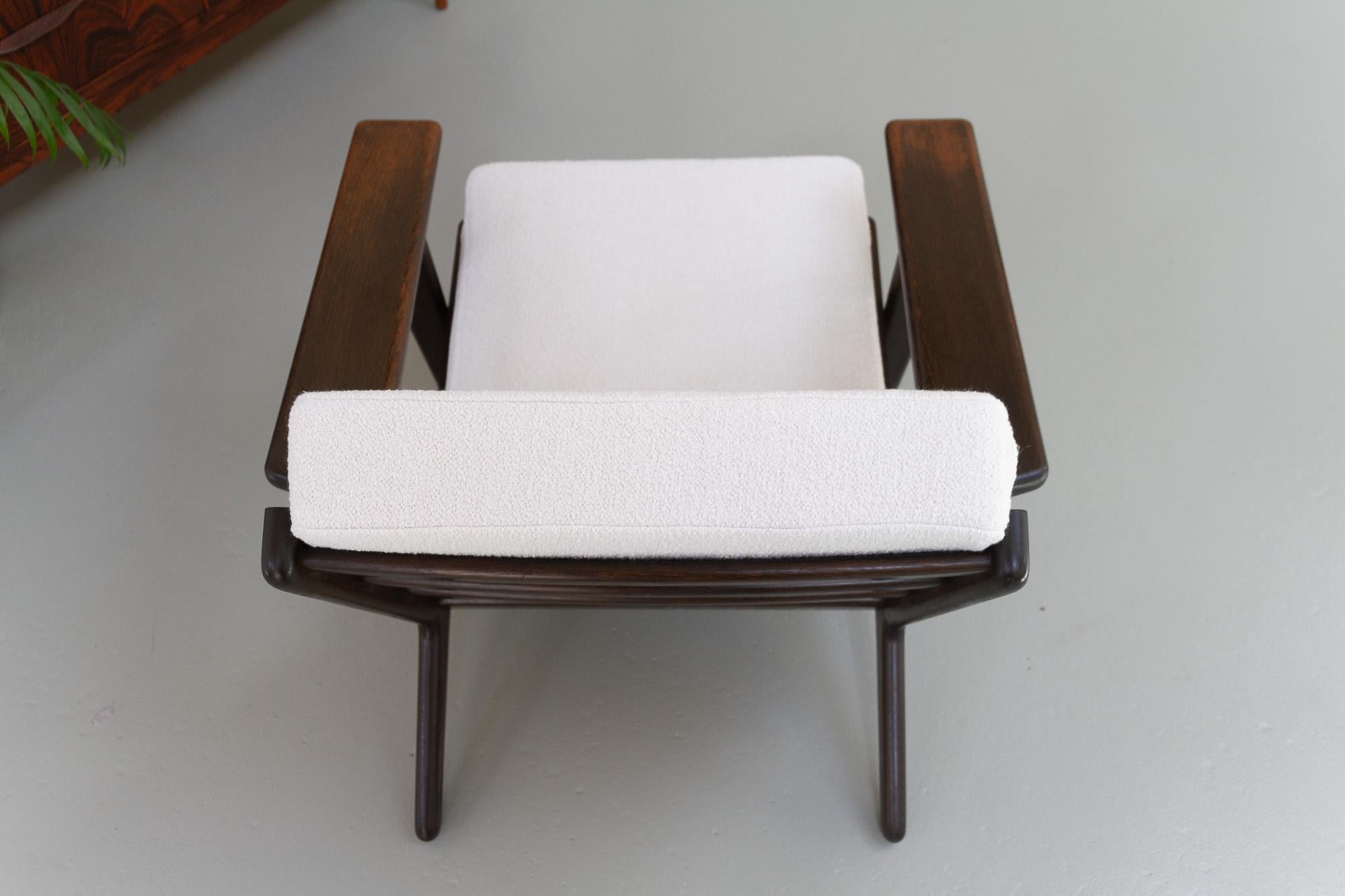 Scandinavian Modern Vintage Danish Oak and Bouclé Lounge Chair GE290 by Hans J. Wegner, 1960s For Sale