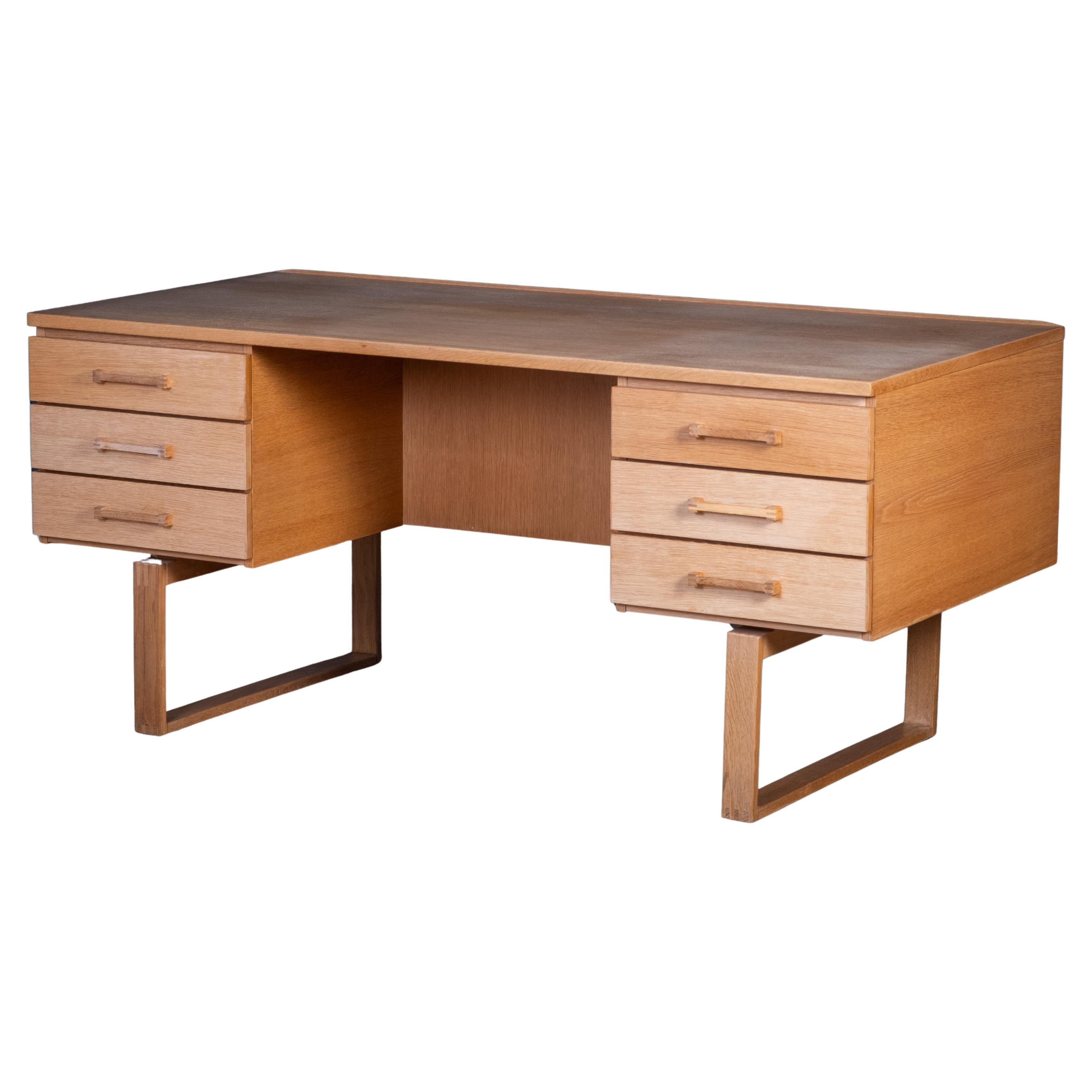 Vintage Danish Oak Desk by Henning Jensen 
Torben Valeur for Dyrlund, 1960s For Sale