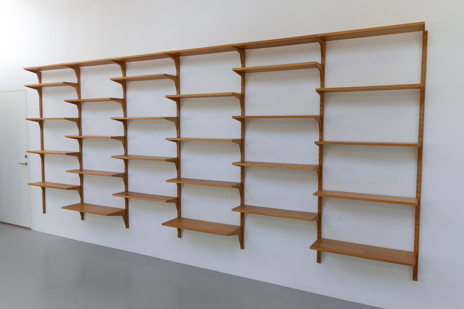 Mueble Modular de Roble Danés Vintage de Poul Cadovius para Cado, años 60.

Estantería escandinava moderna de mediados de siglo, de 6 huecos, modelo Cado. Se trata de una original librería flotante vintage diseñada por el arquitecto danés Poul