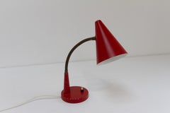 Vintage Danish Red and Brass Flexible Desk Lamp by Lyfa, 1950s.